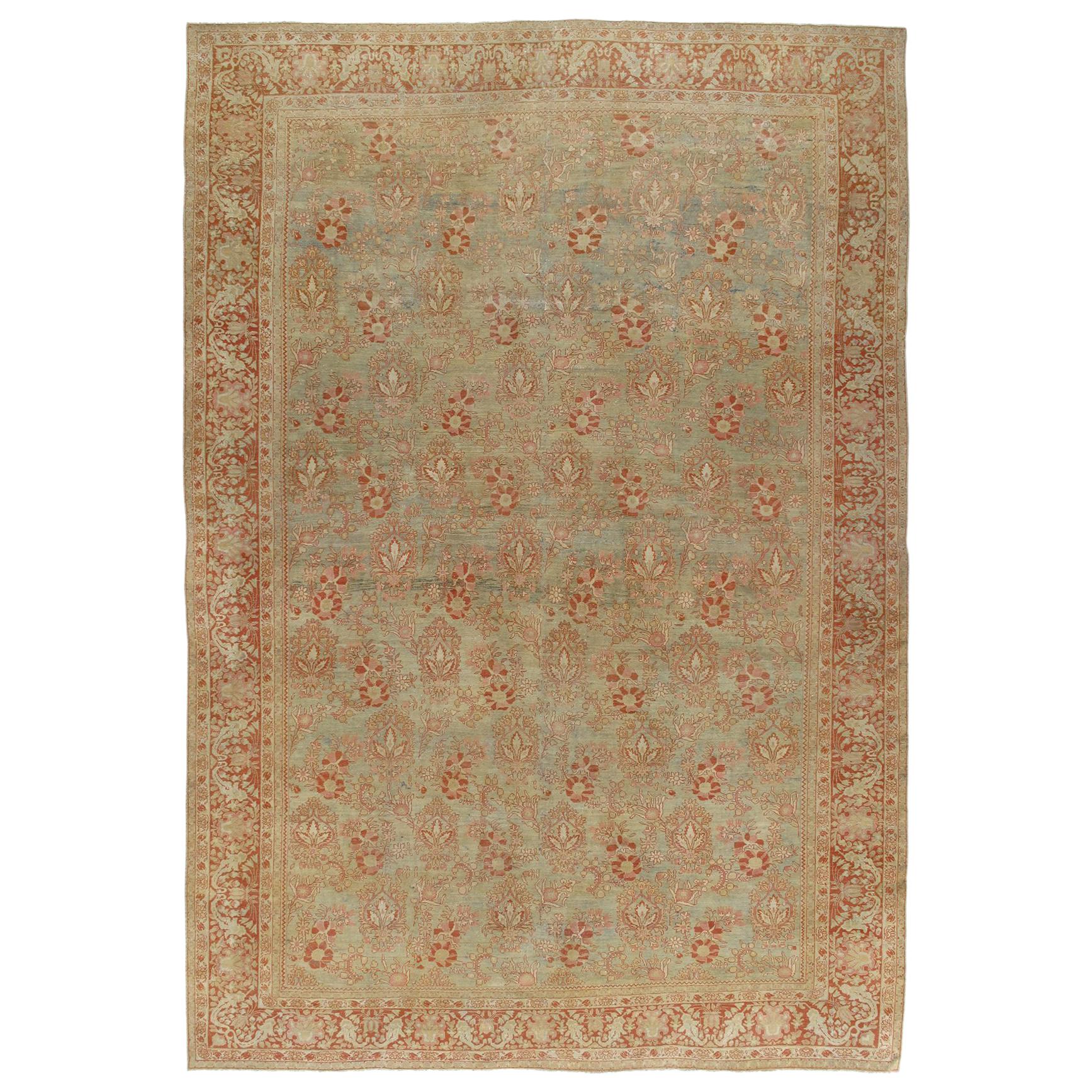 Antique Persian Tabriz Hand-Knotted Rug with Light Blues, Greens and Rust Colors For Sale