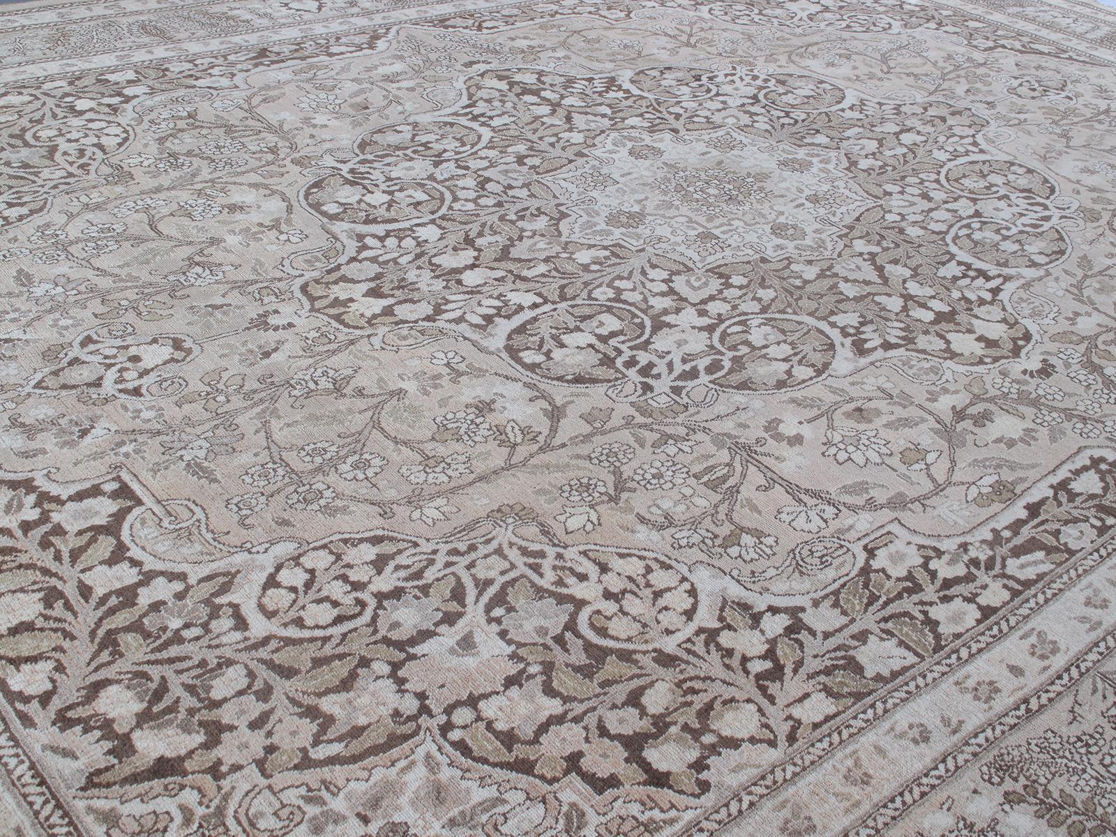 This antique Persian Tabriz Hadji Jalili hand-knotted rug is made from the finest hand-carded, hand-spun wool and all vegetable dyes. It represents the unique style of rug making that goes back over 150 years. The Hadji Jalili workshop created a