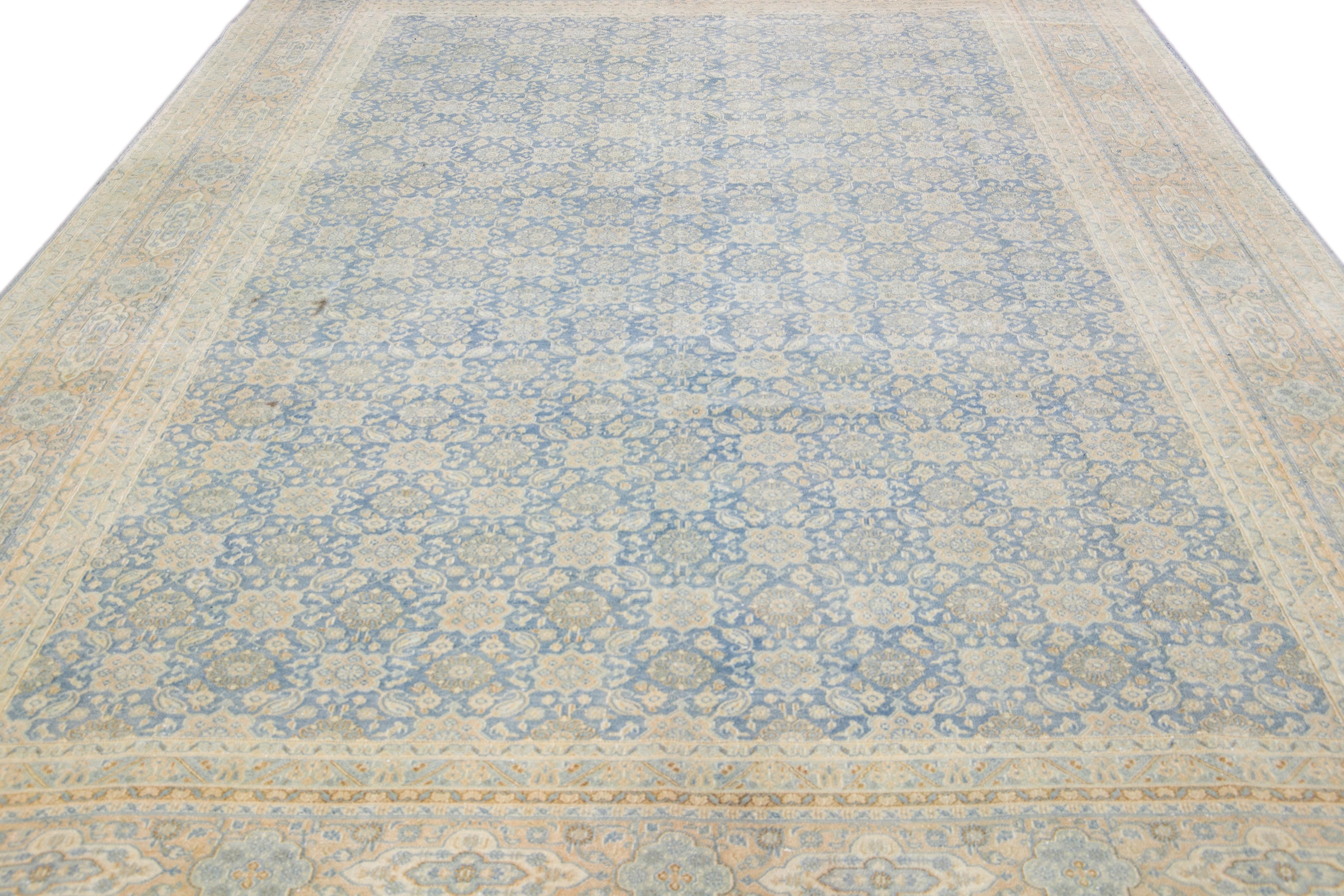 Islamic Antique Persian Tabriz Handmade Floral Pattern Blue Wool Rug For Sale