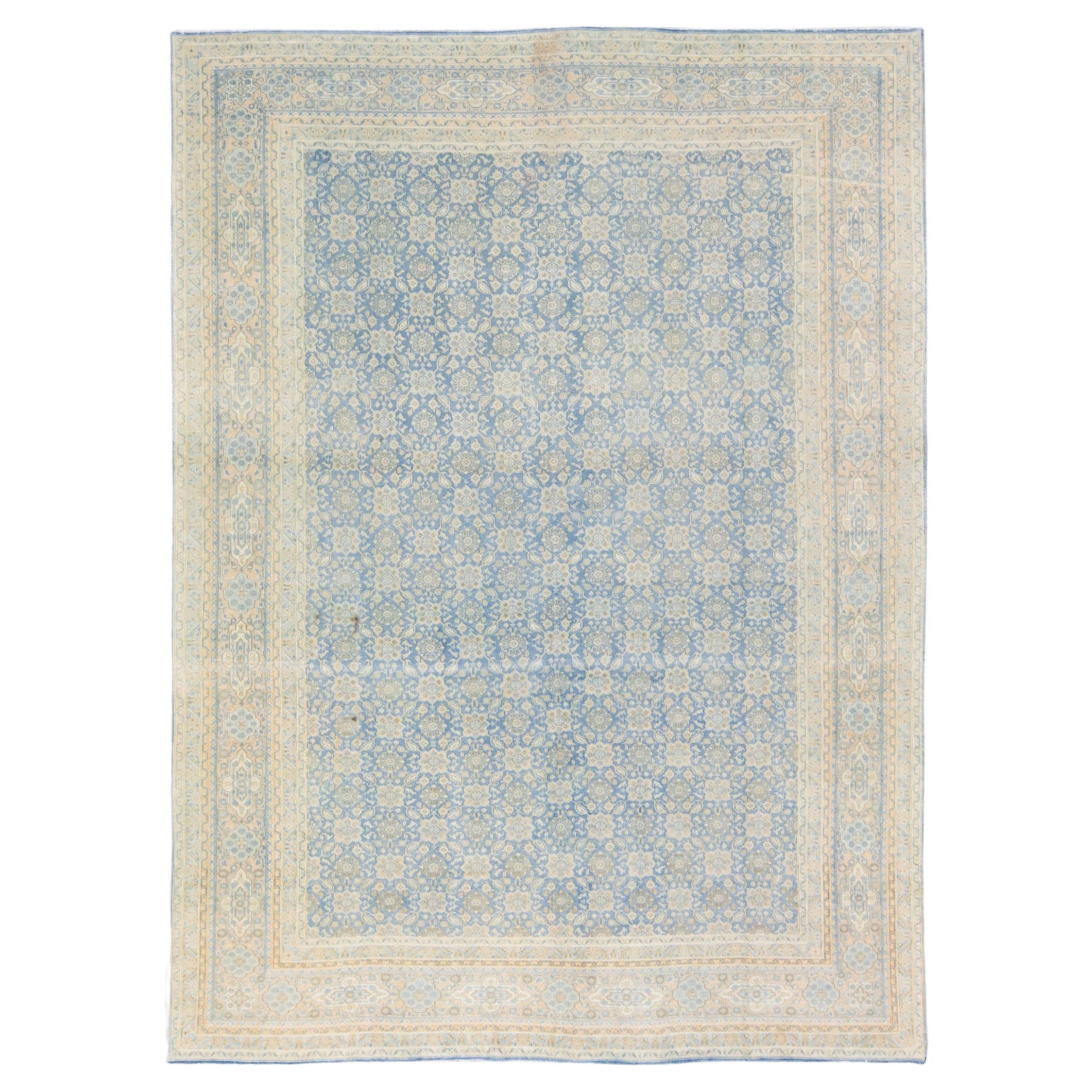 Antique Persian Tabriz Handmade Floral Pattern Blue Wool Rug For Sale