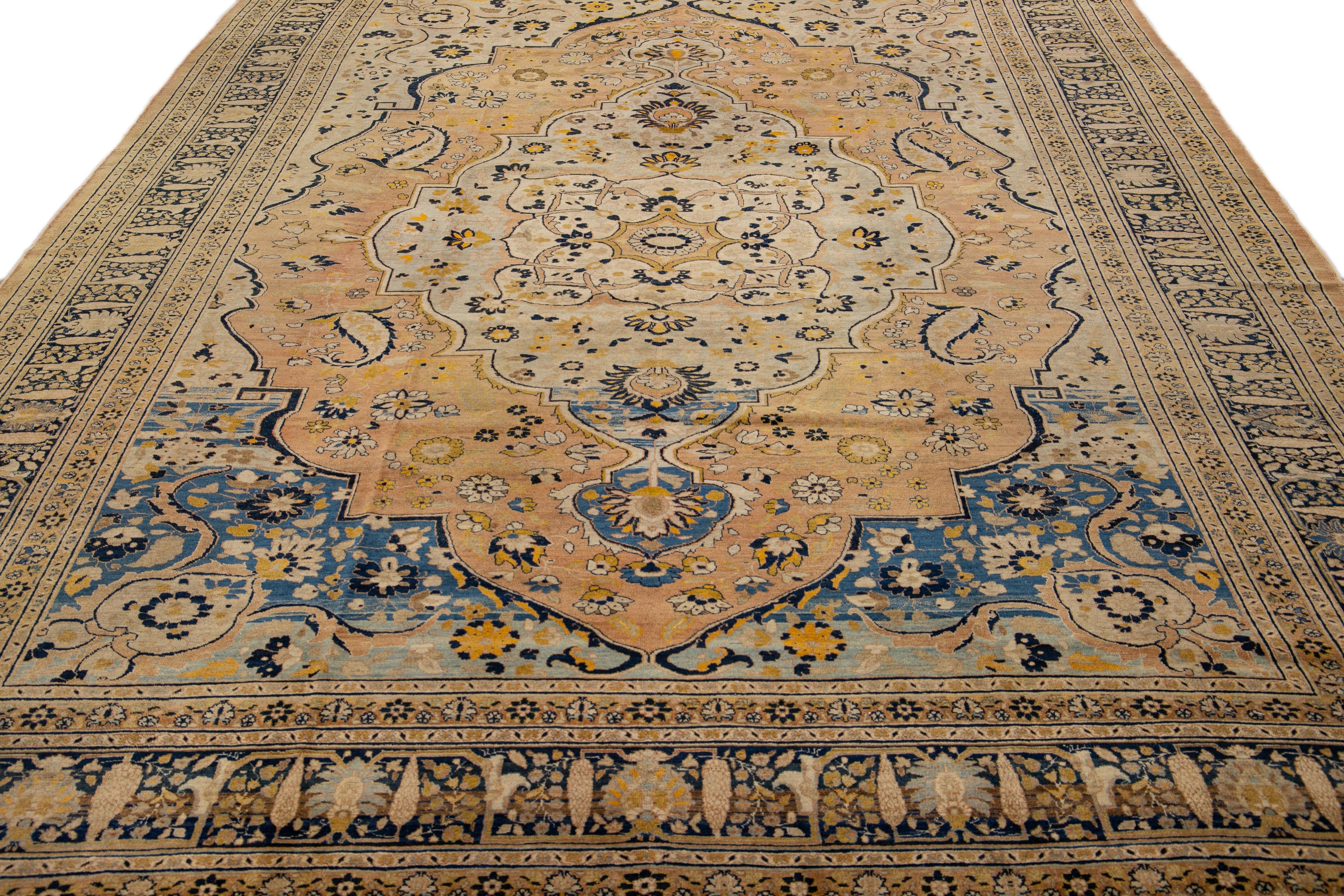 Asian Antique Persian Tabriz Handmade Medallion Motif Blue And Beige Wool Rug For Sale
