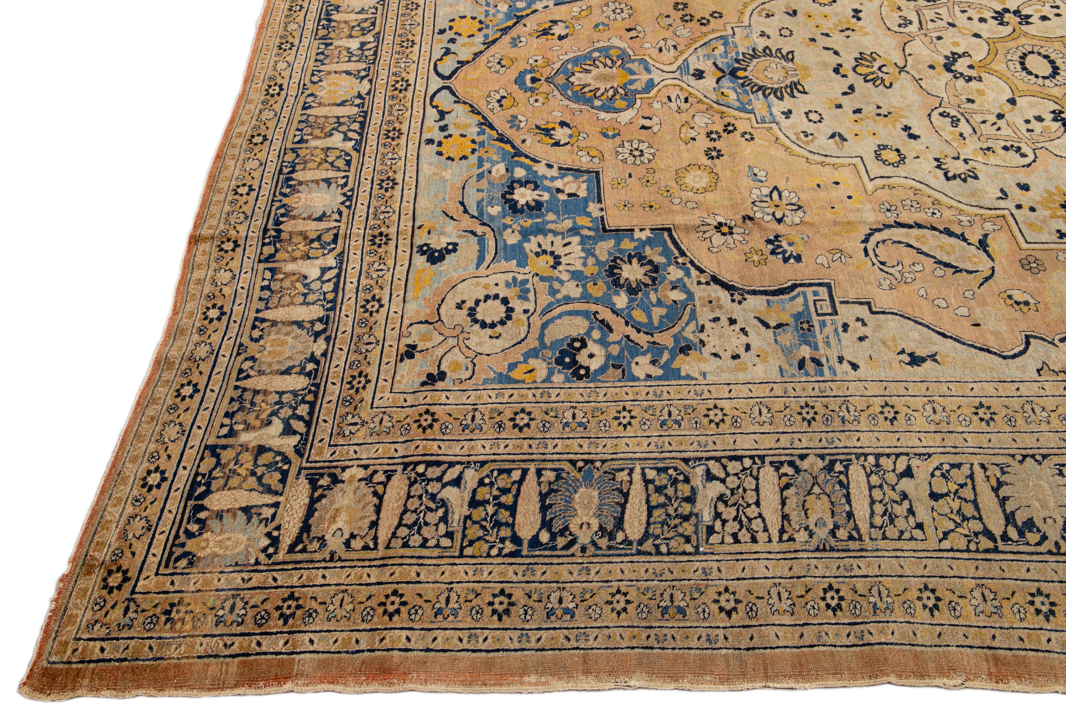Antique Persian Tabriz Handmade Medallion Motif Blue And Beige Wool Rug In Good Condition For Sale In Norwalk, CT
