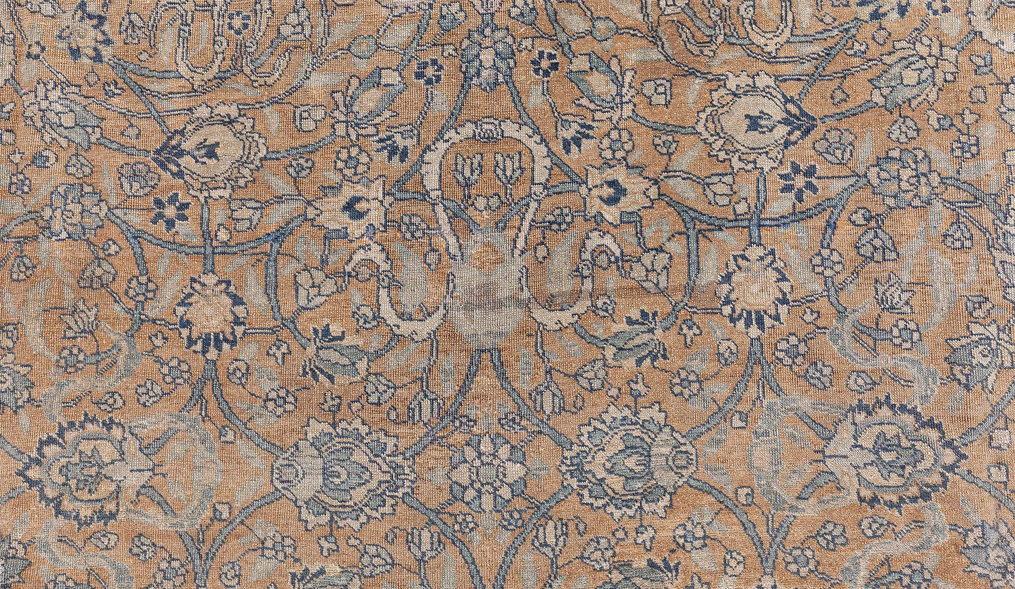 Antique Persian Tabriz Handmade Wool Rug
Size: 10'5