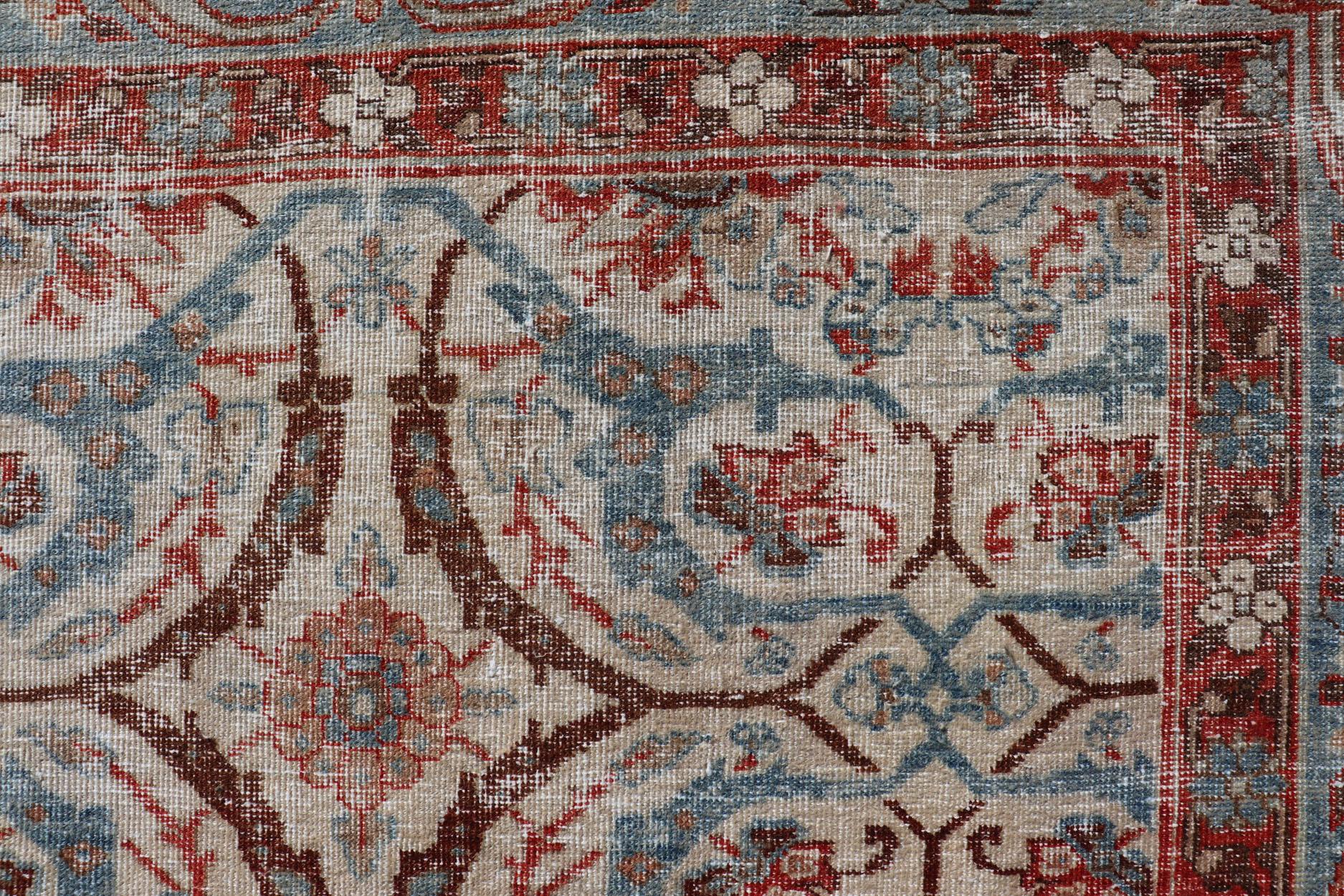Wool Antique Persian Tabriz Herati Circular Design in Ivory, Lt. Blue, Red, Brown For Sale