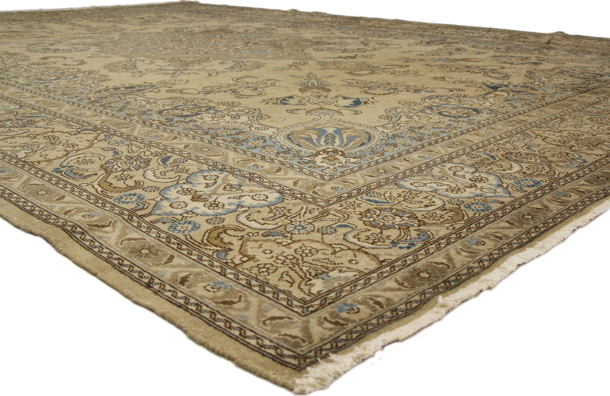 72641 Antique Persian Tabriz Medallion rug with Traditional style and coastal vibes. Emanating coastal vibes with a warm coastal color palette, this hand-knotted wool antique Persian Tabriz rug is a captivating vision of woven beauty. The abrashed