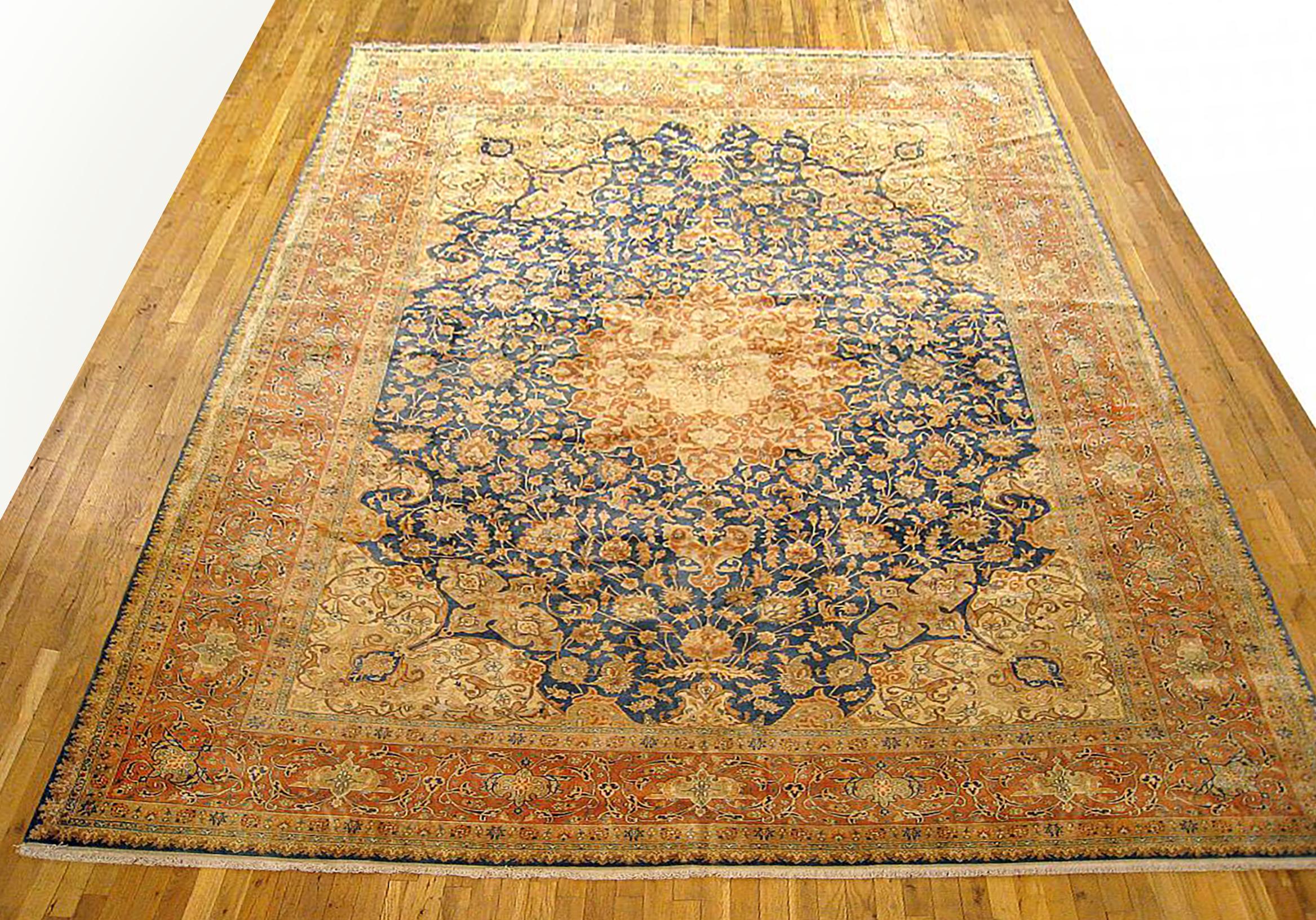 Vintage Perisan Tabriz  Oriental Carpet, circa 1940, Room Sized

A vintage Persian Tabriz oriental carpet, circa 1940. Size: 12'9