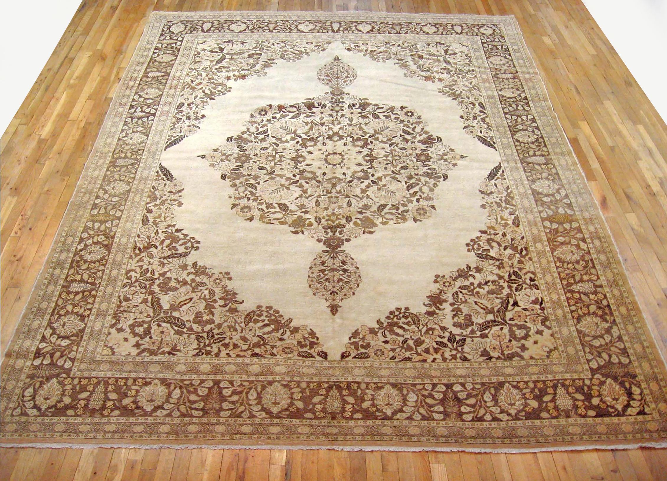 Antique Persian Tabriz Oriental carpet, circa 1910, Room Sized

An antique Persian Tabriz oriental carpet, circa 1910. Size: 12'9