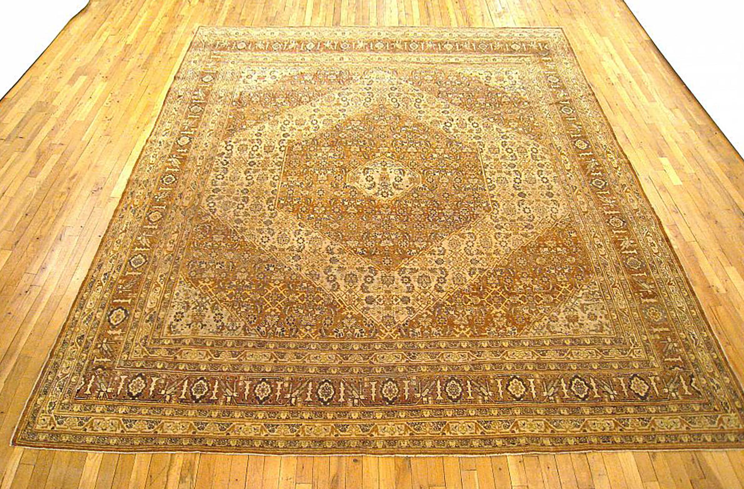 Antique Persian Tabriz  Oriental Carpet, circa 1900, Room Sized

An antique Persian Tabriz oriental carpet, circa 1900. Size: 12'2