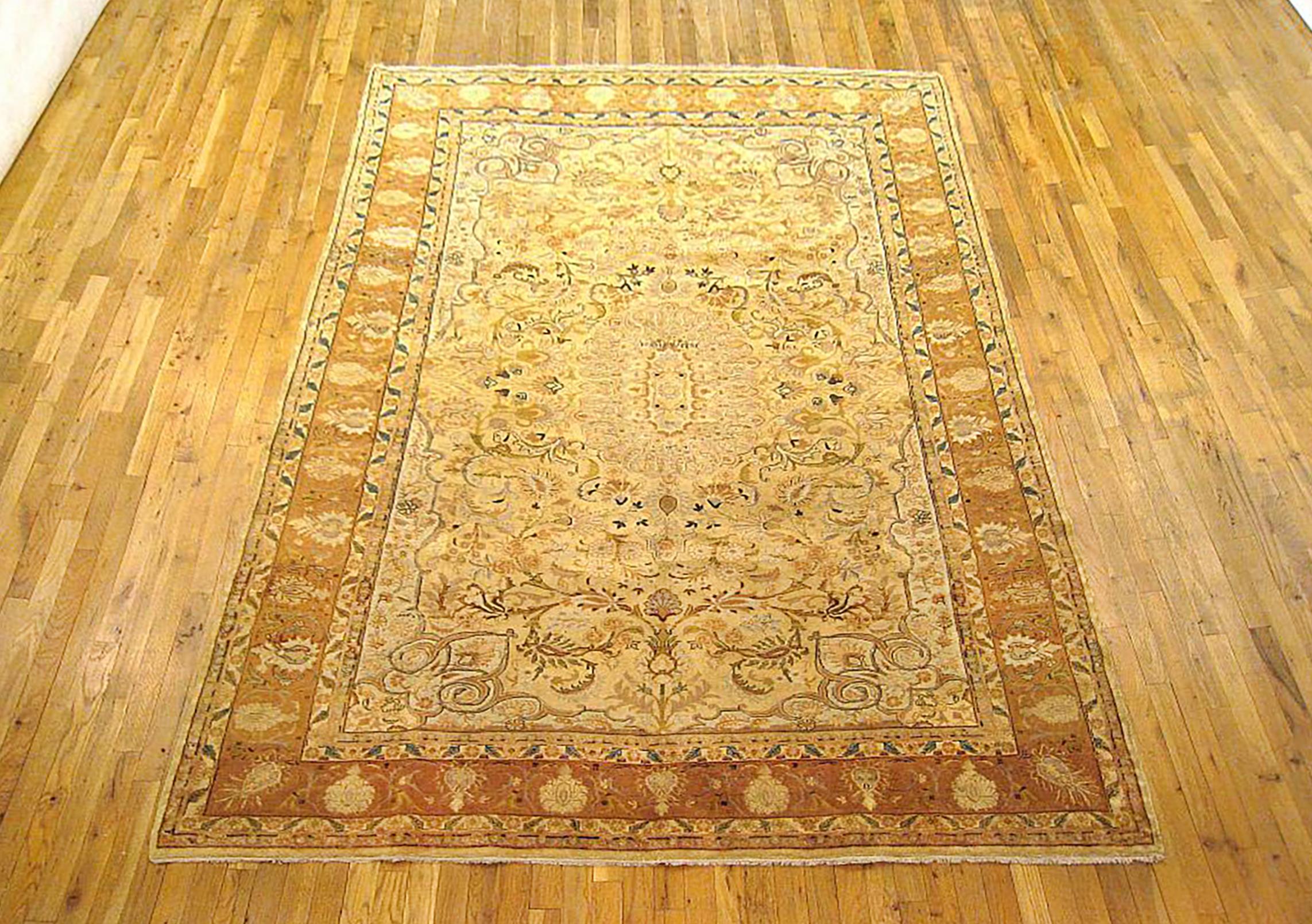 Antique Perisan Tabriz  Oriental Carpet, circa 1920, Room Sized

An antique Persian Tabriz oriental carpet, circa 1920. Size: 10'0