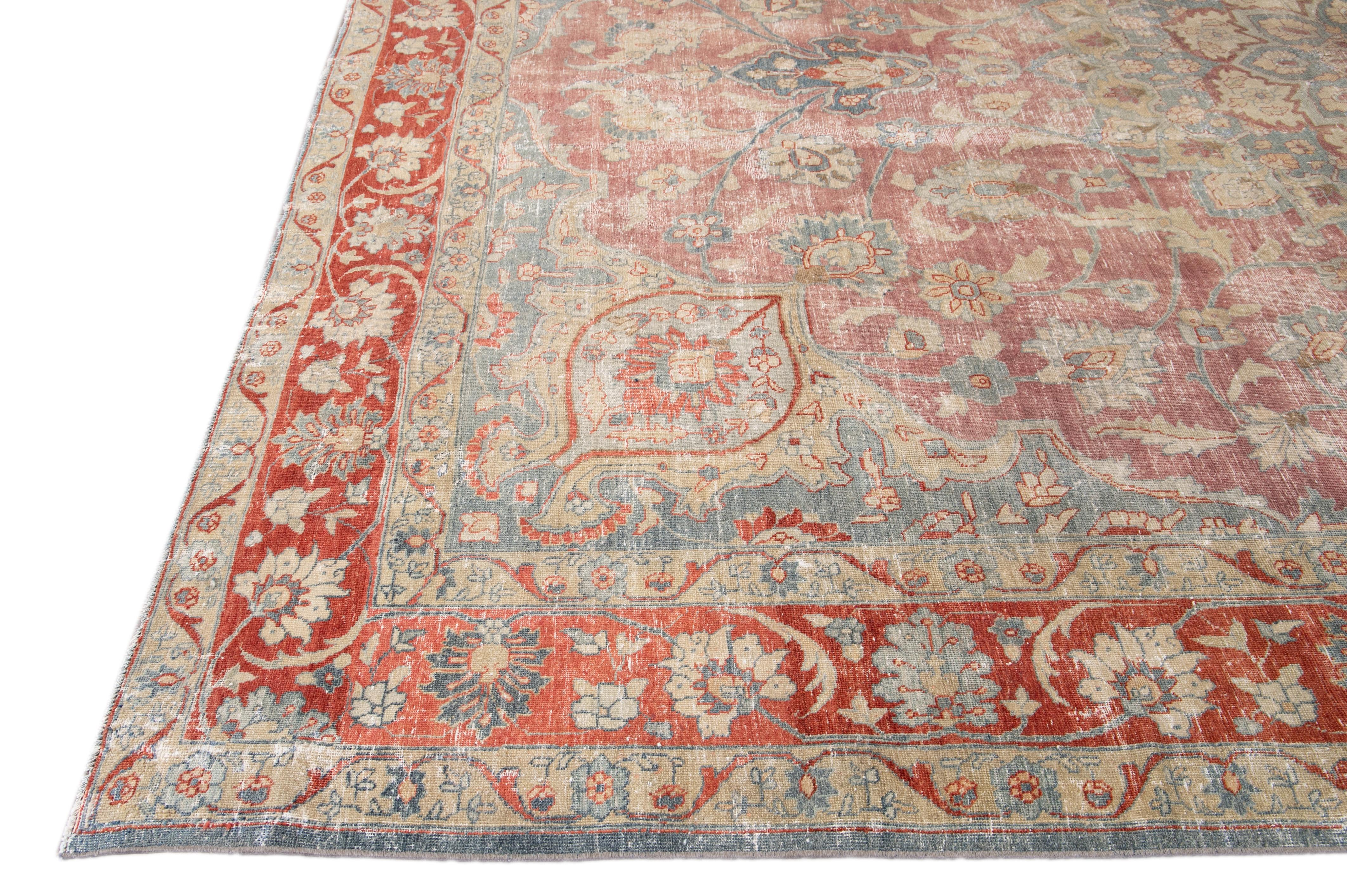 Antique Persian Tabriz Red and Blue Handmade Medallion Floral Wool Rug In Distressed Condition For Sale In Norwalk, CT