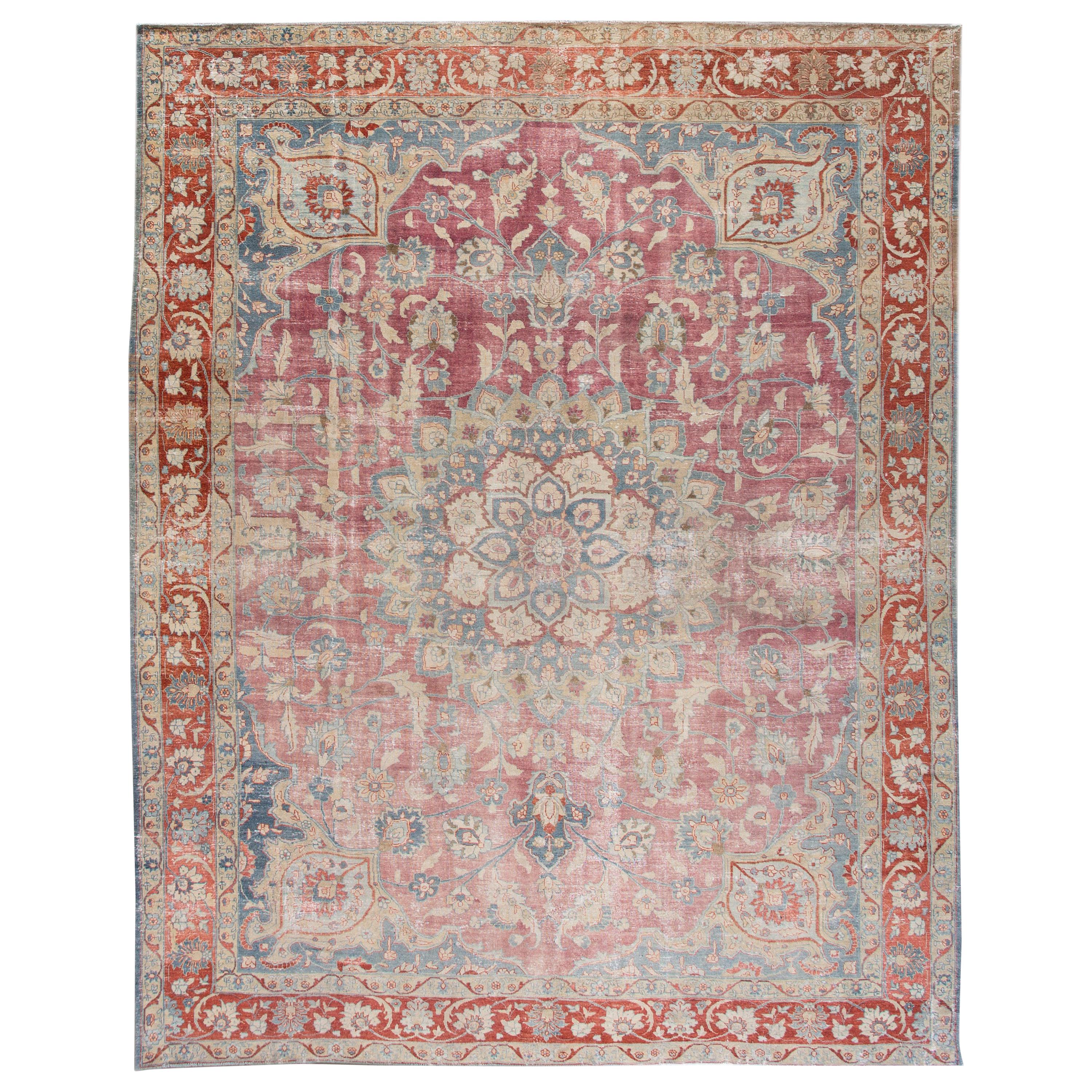 Antique Persian Tabriz Red and Blue Handmade Medallion Floral Wool Rug For Sale
