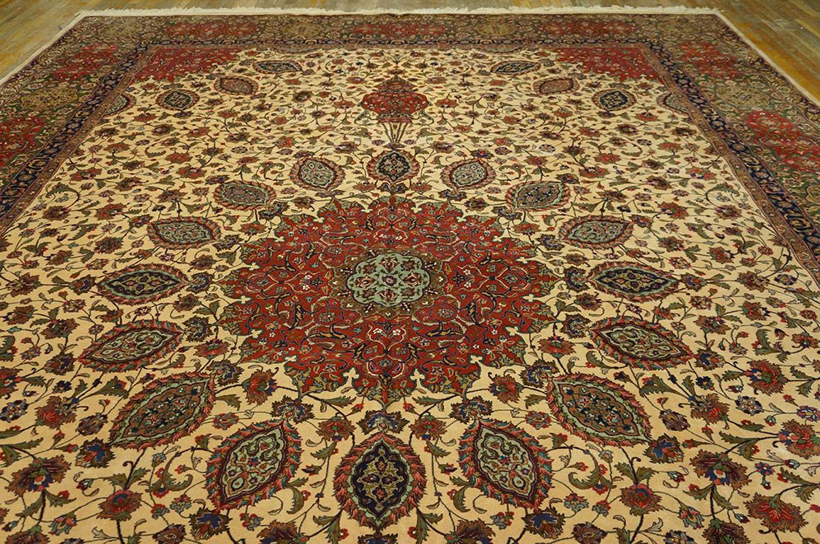 Antique Persian Tabriz rug, size: 11' 7'' x 16' 6''.