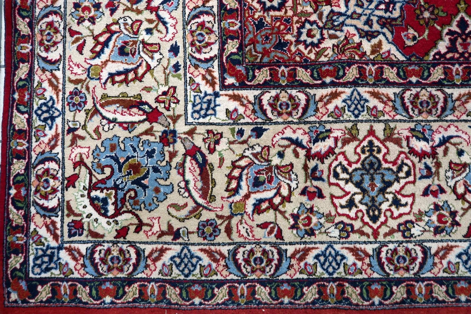 A magnificent antique Persian Tabriz rug from the early 1900s, representing over a century of Persian weaving excellence. This exceptional hand-knotted wool masterpiece showcases the sophisticated artistry and technical mastery that made Tabriz one