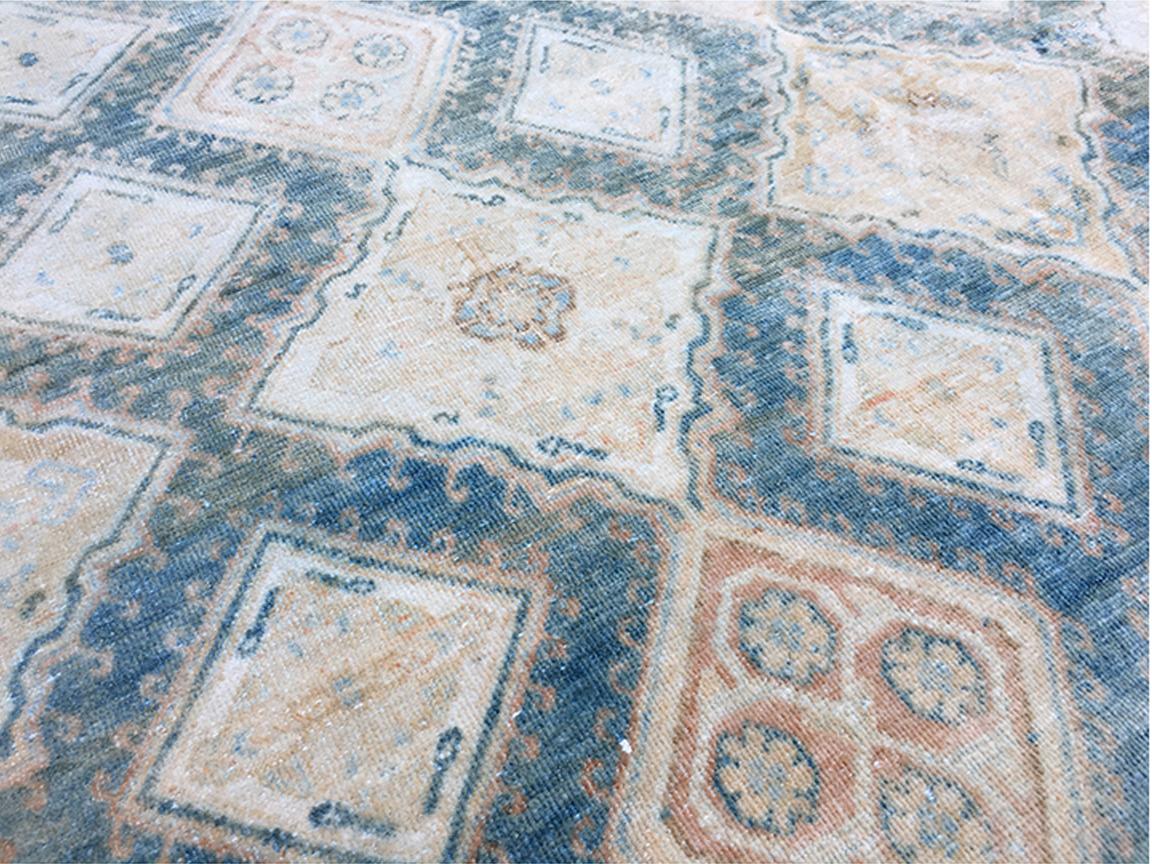 Beautiful Antique Persian Tabriz Rug 5335, Country of Origin: Antique Persian Rugs, Circa Date: 1920 – This beautiful, rich Tabriz carpet was produced around the turn of the 20th century. The warm, blues earthy orange create a peaceful and serene