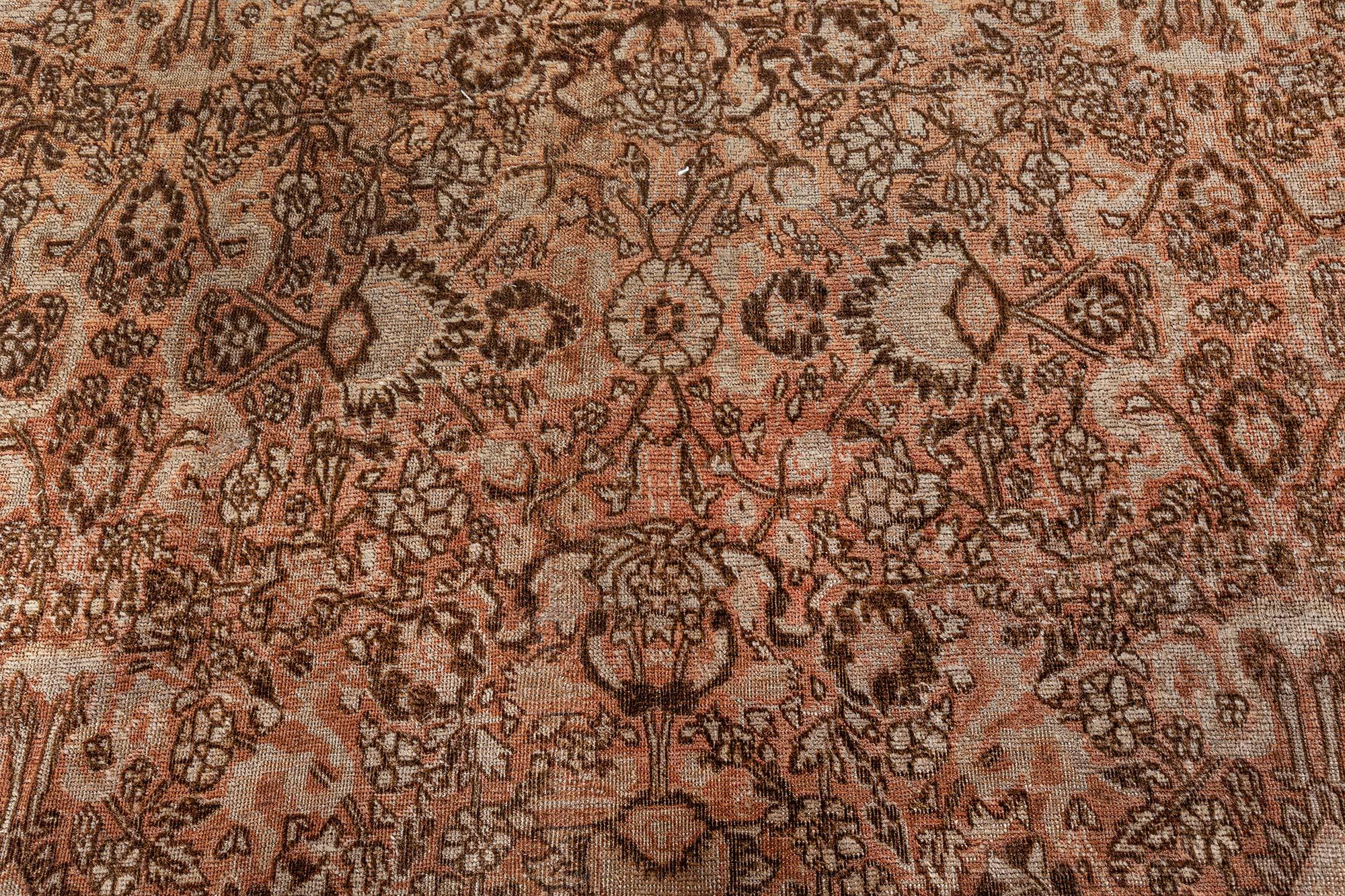 Antique Persian Tabriz rug.
Size: 9'2