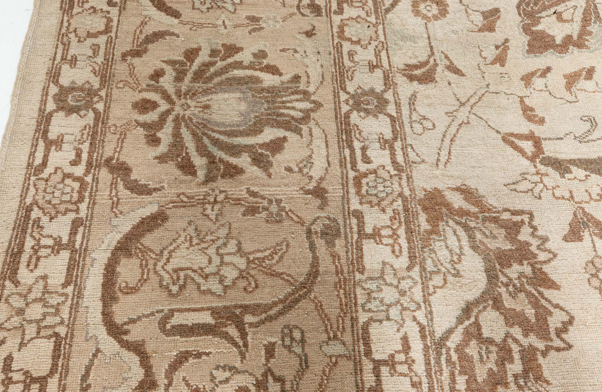 Antique Persian Tabriz rug
Size: 10'3