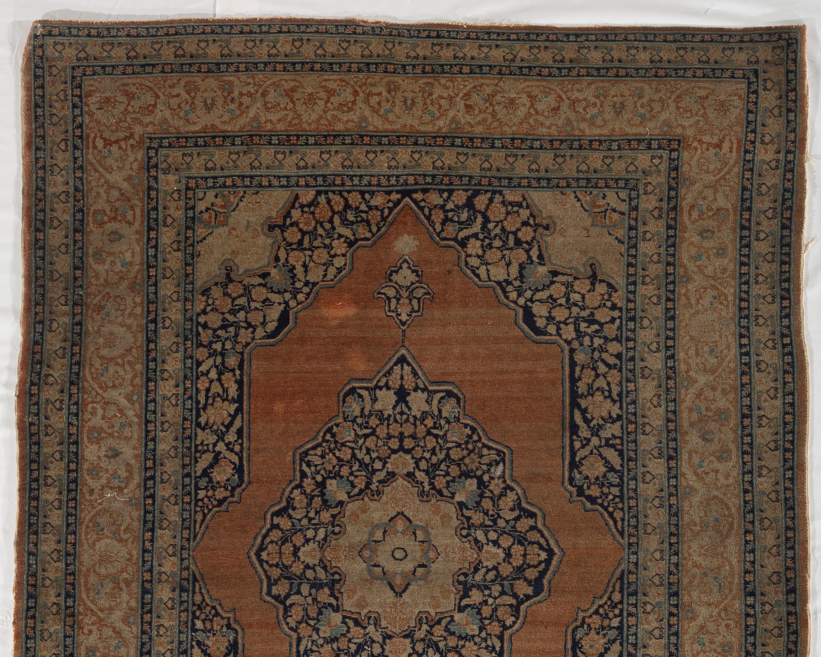 Antique Persian Tabriz, circa 1890. A hand knotted wool vintage Persian Tabriz rug with a Traditional Design that works so well in both a modern or conventional room setting. Size: 4'3 x 6'3.