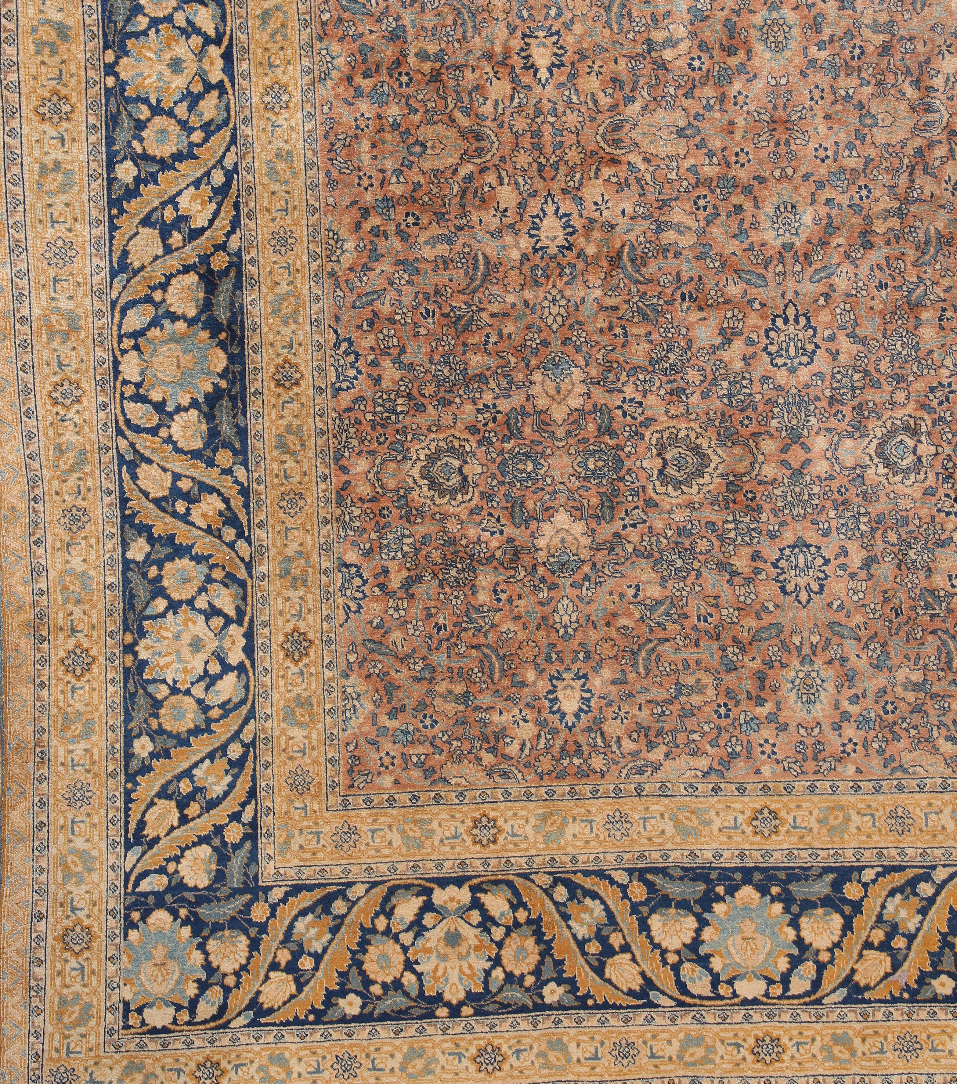 Antique Persian Tabriz rug, circa 1900, measures: 10'10 x 13'9. Tabriz is the capital of the North-western province of Azerbaijan in Northwest Persia and for centuries has enjoyed a great reputation as a centre of Oriental culture. Genghis Kahn