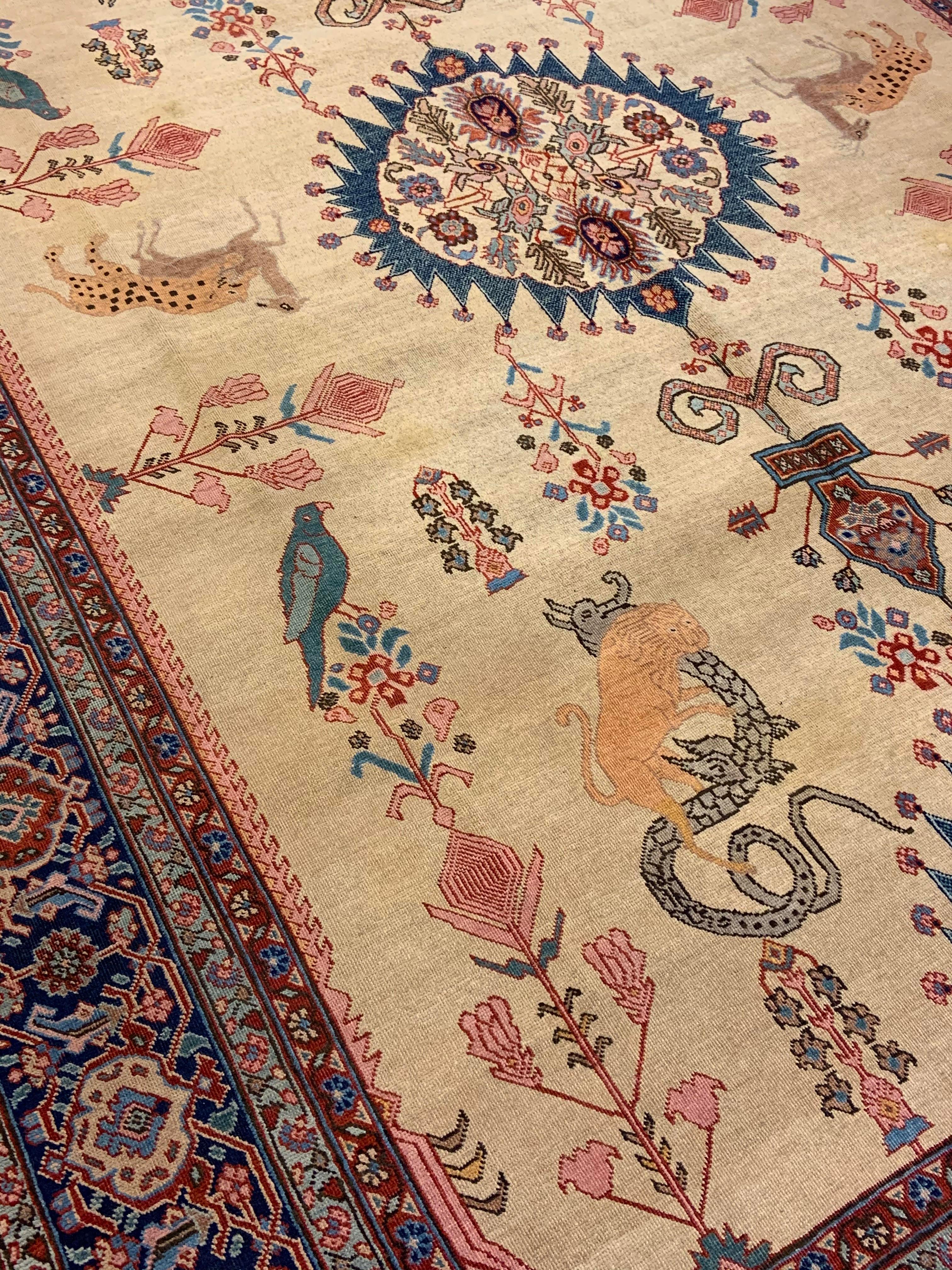 Early 20th Century Antique Persian Tabriz rug Fine Ivory Rug with Animals and Flowers For Sale