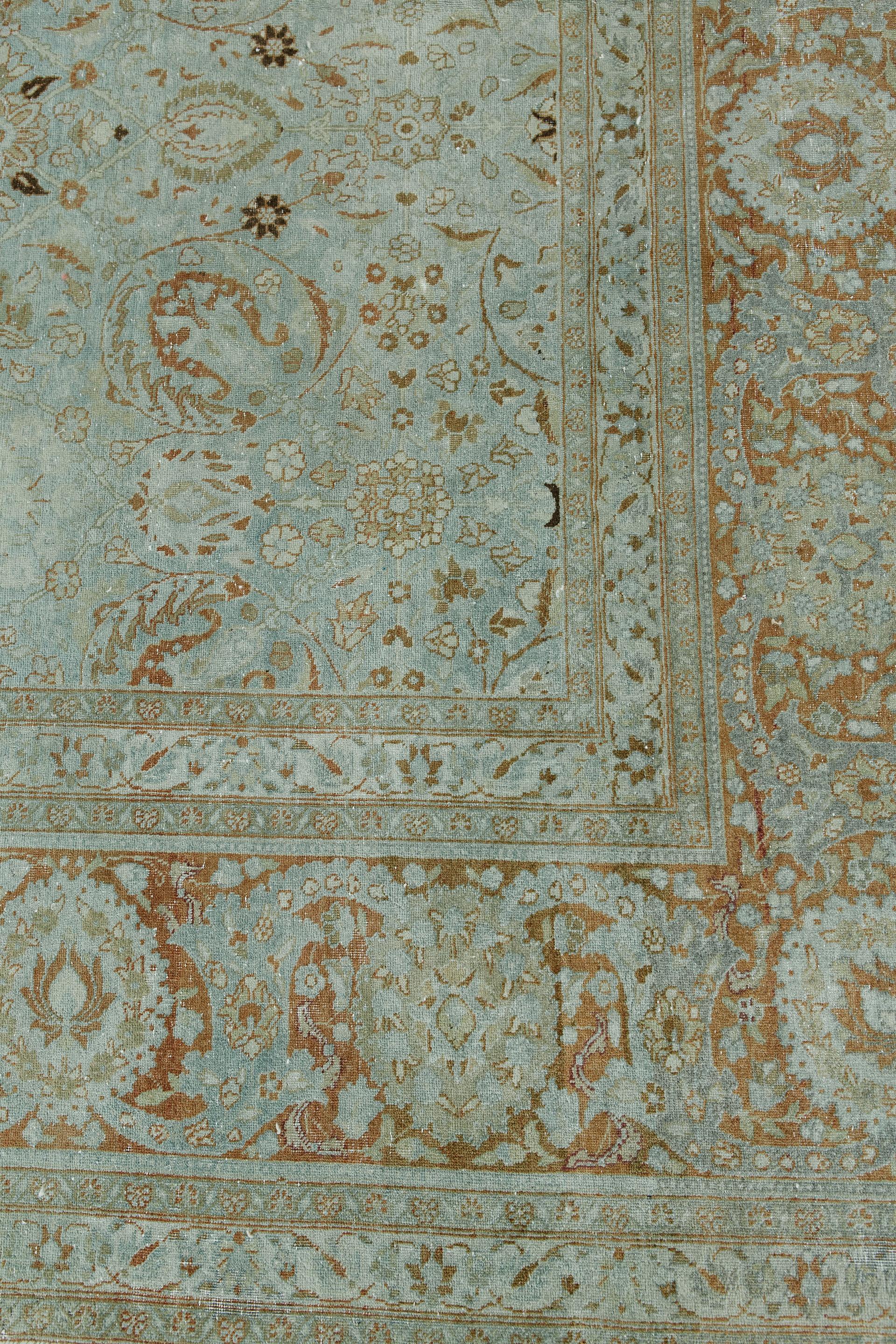 Woven of Classic medallion all over pattern built on a soft pastel blue tone with accents of rust orange. Over 100 years old this hand knotted piece comes from the center of carpet production, Tabriz in Northwest Iran/Persia.

Rug number:
