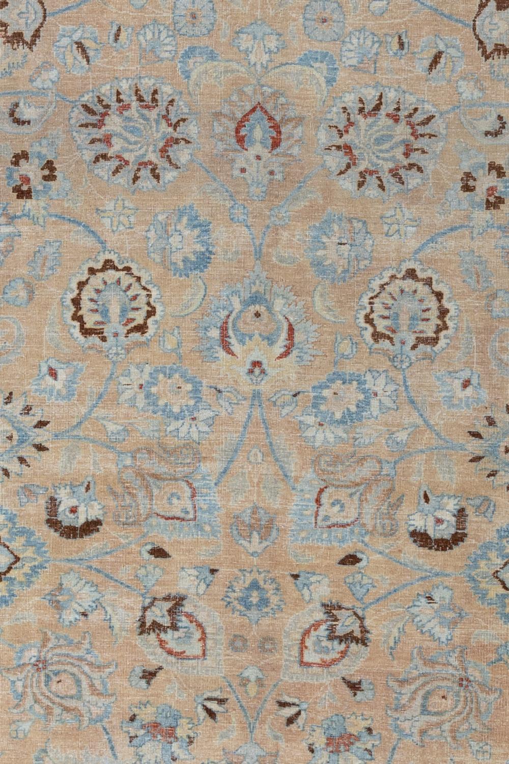 Antique Persian Tabriz, circa 1920. Low, shaved pile. Warm golden yellow field with blue flowers and pops of roses pink.

Wear notes: none

Wear Guide:
Vintage and antique rugs are by nature, pre-loved and may show evidence of their past. There are