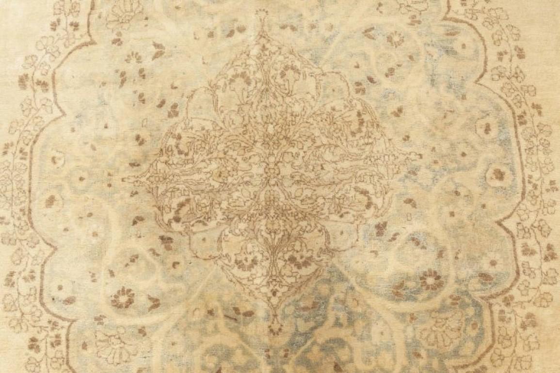 Antique Persian Tabriz rug
Size: 11'2