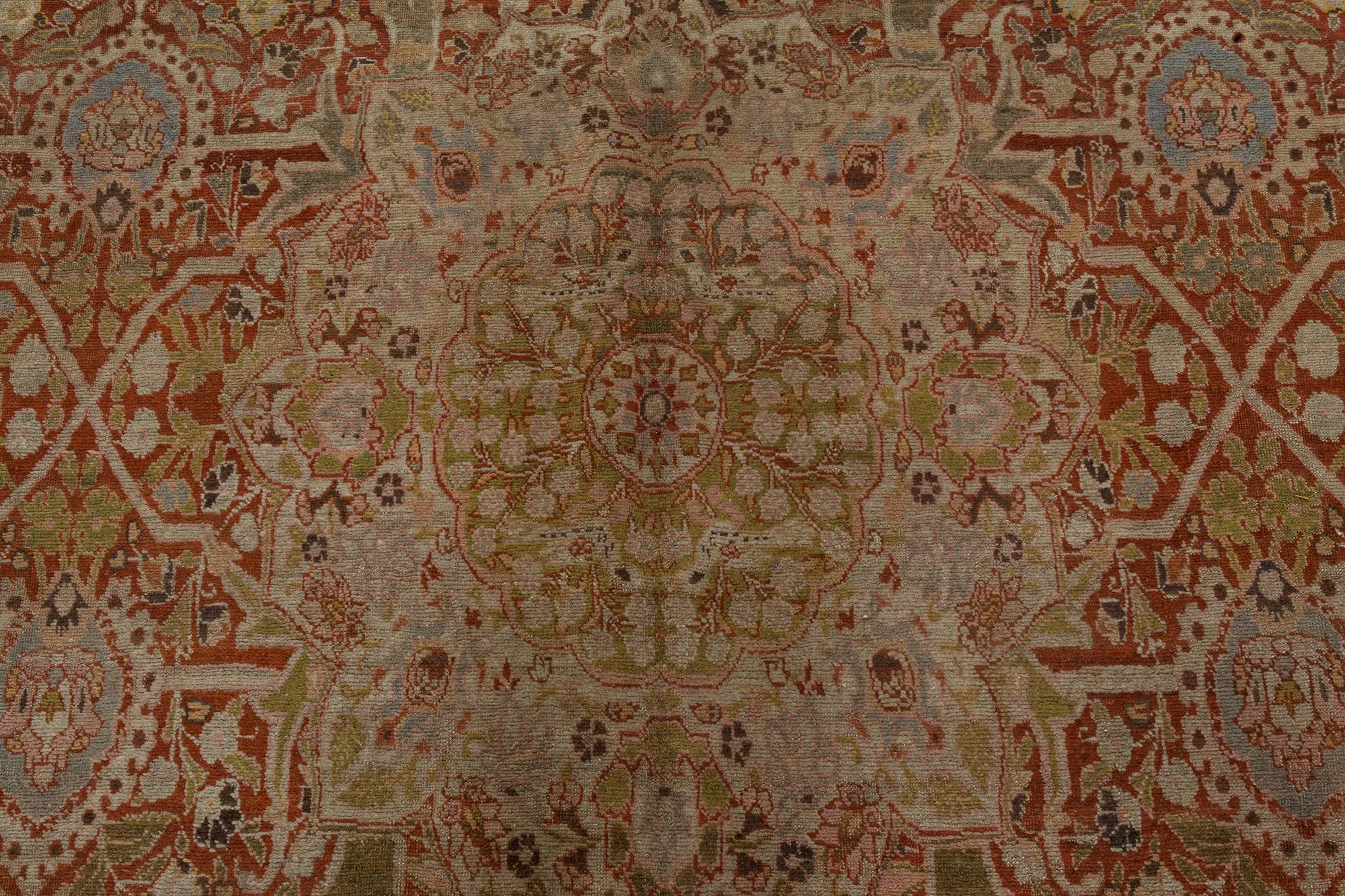 Fine Antique Persian Tabriz hand knotted wool rug
Size: 9'3