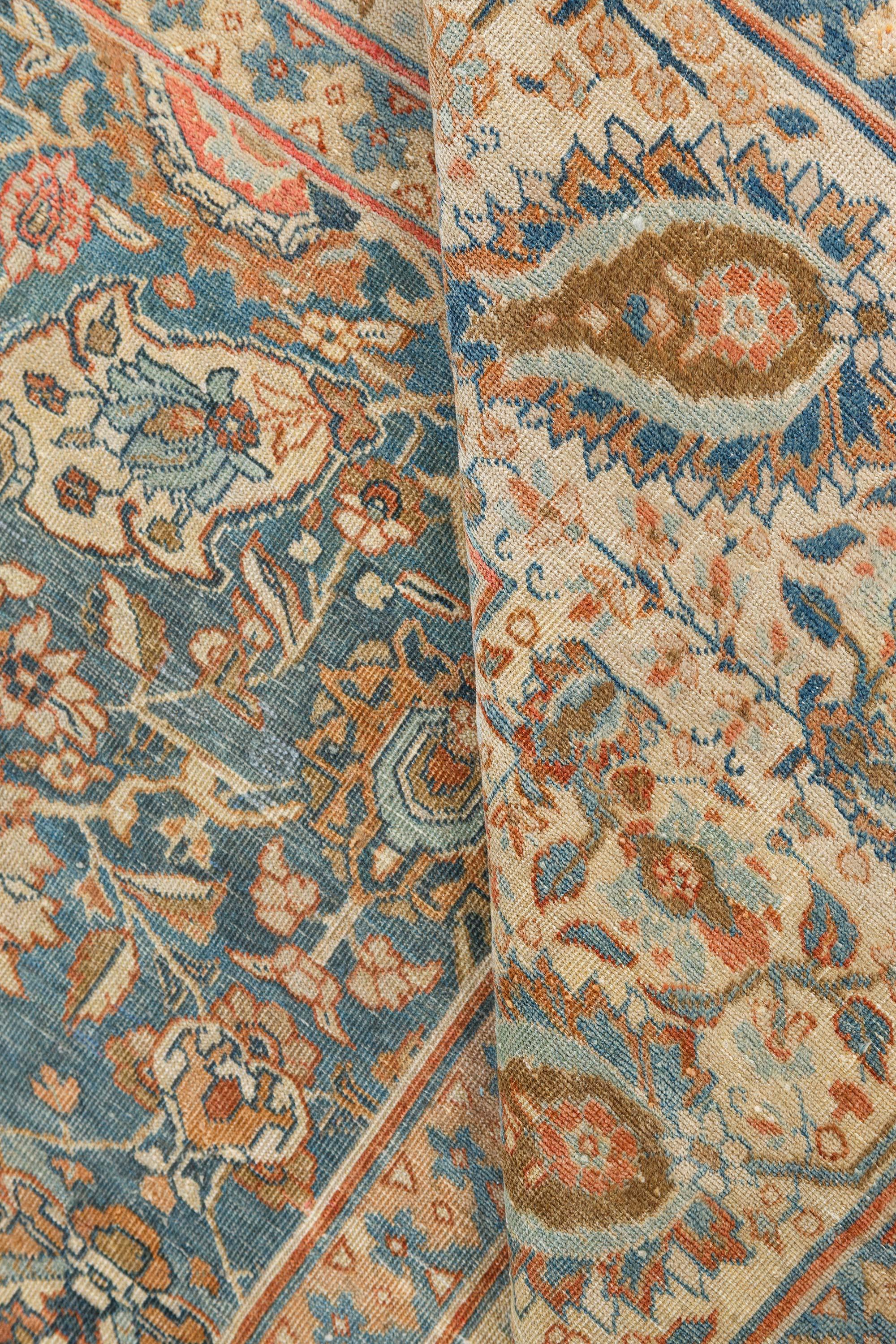 Antique Persian Tabriz rug in blue and brown
Size: 8'4