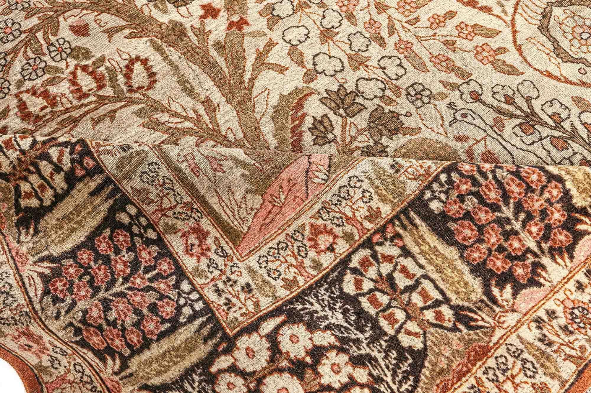 Antique Persian Tabriz rug
Size: 10'9