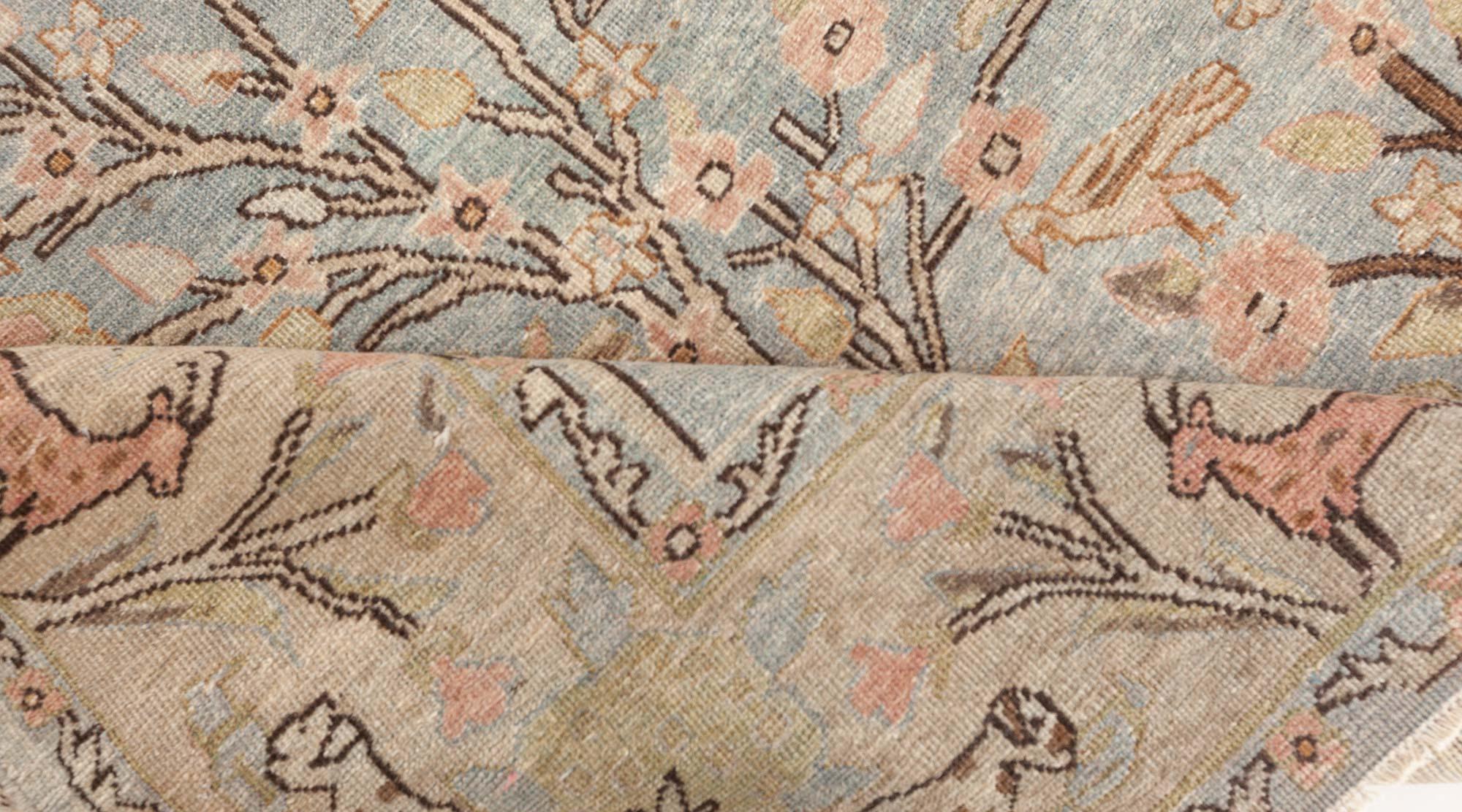 Antique Persian Tabriz rug
Size: 7'4