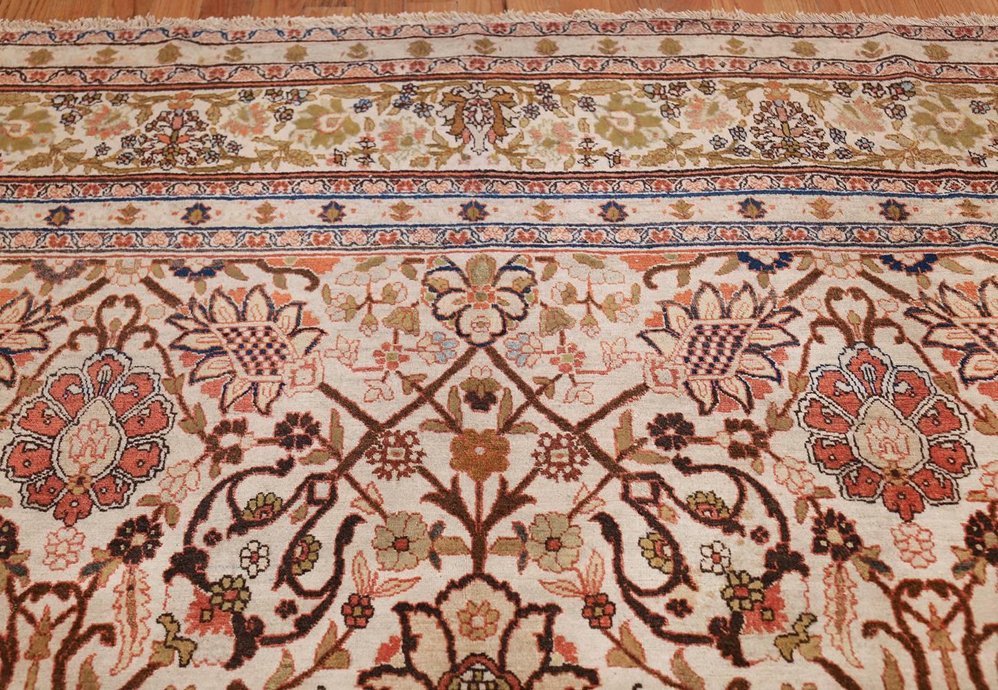 Antique Persian Tabriz Rug. Size: 9 ft x 13 ft (2.74 m x 3.96 m) 2