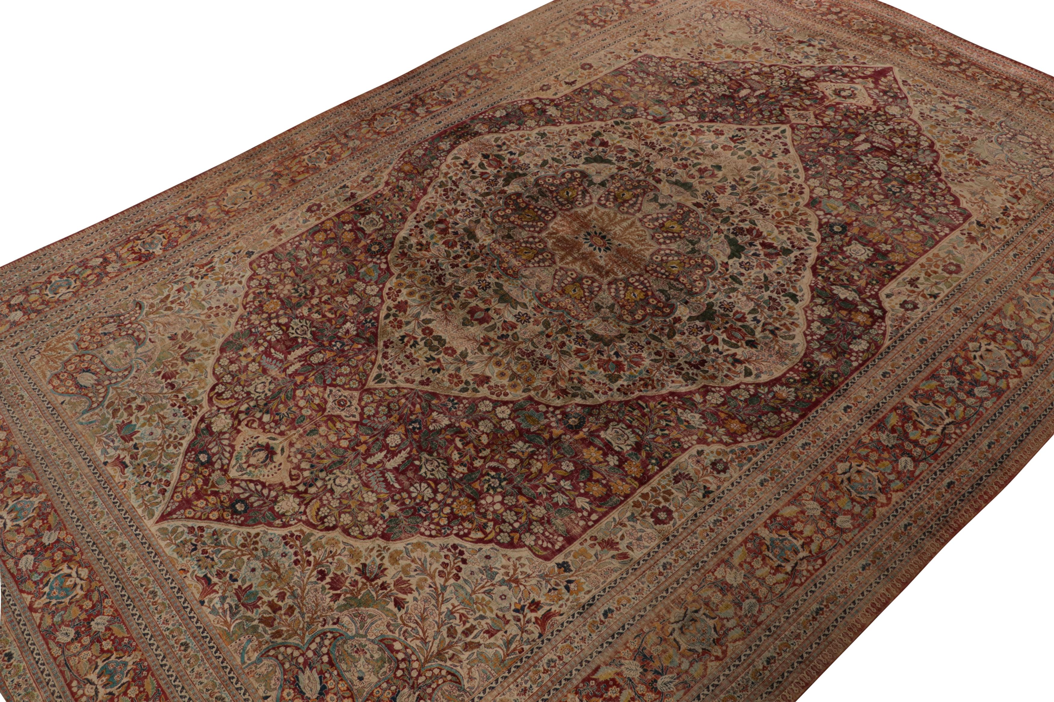 Hand-knotted in silk, this 12x18 antique Persian Tabriz oversized rug is an extremely rare piece from the works of Hadji Jalili, originating from circa 1860-1870. Its design features detailed court designs, in dense all-over floral patterns and