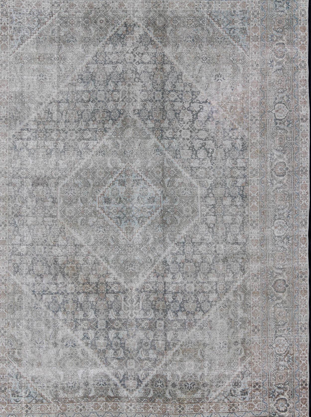 Hand-Knotted Antique Persian Tabriz Rug in Muted Colors with Layered Medallion Design
