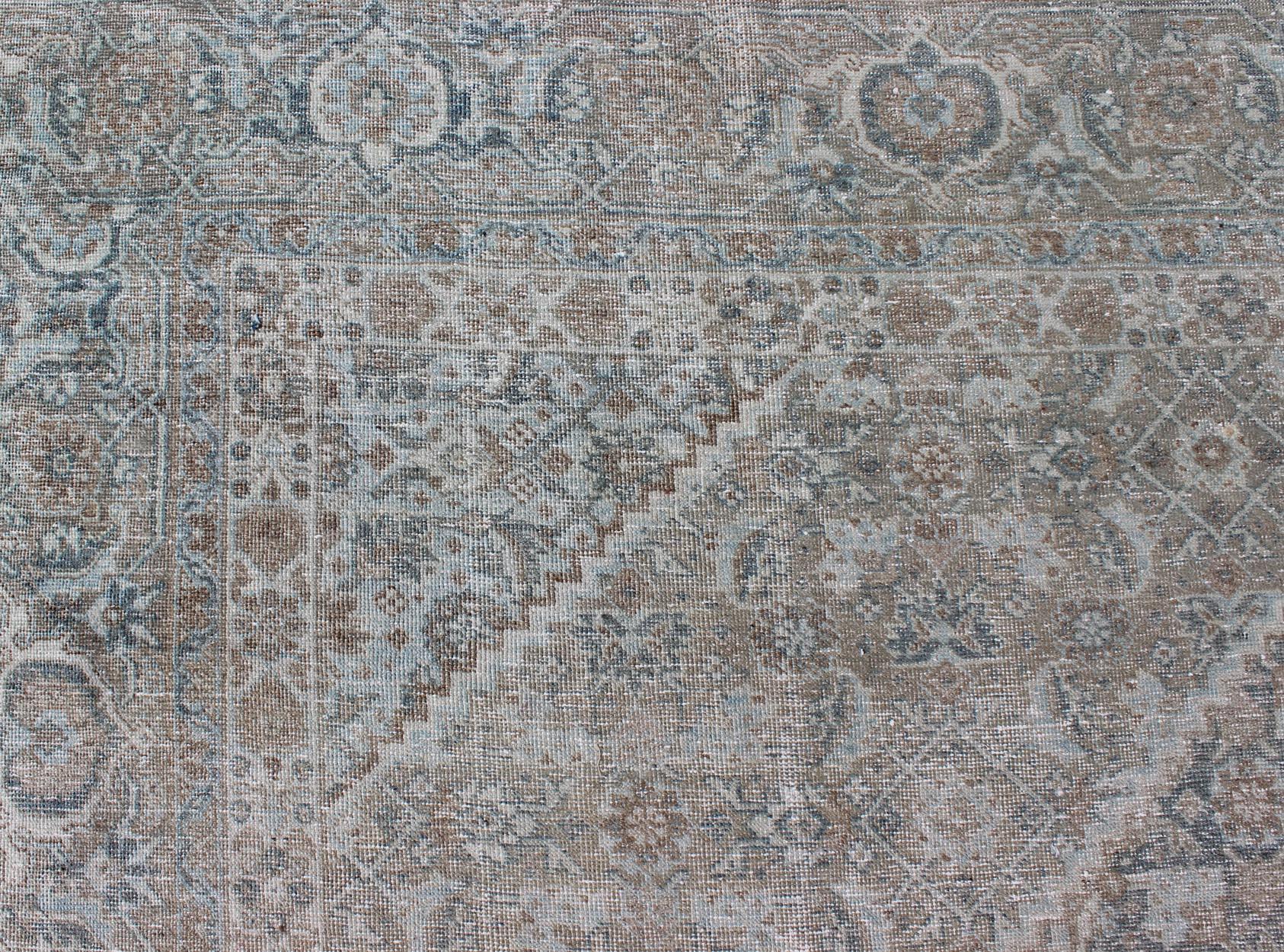 Wool Antique Persian Tabriz Rug in Muted Colors with Layered Medallion Design