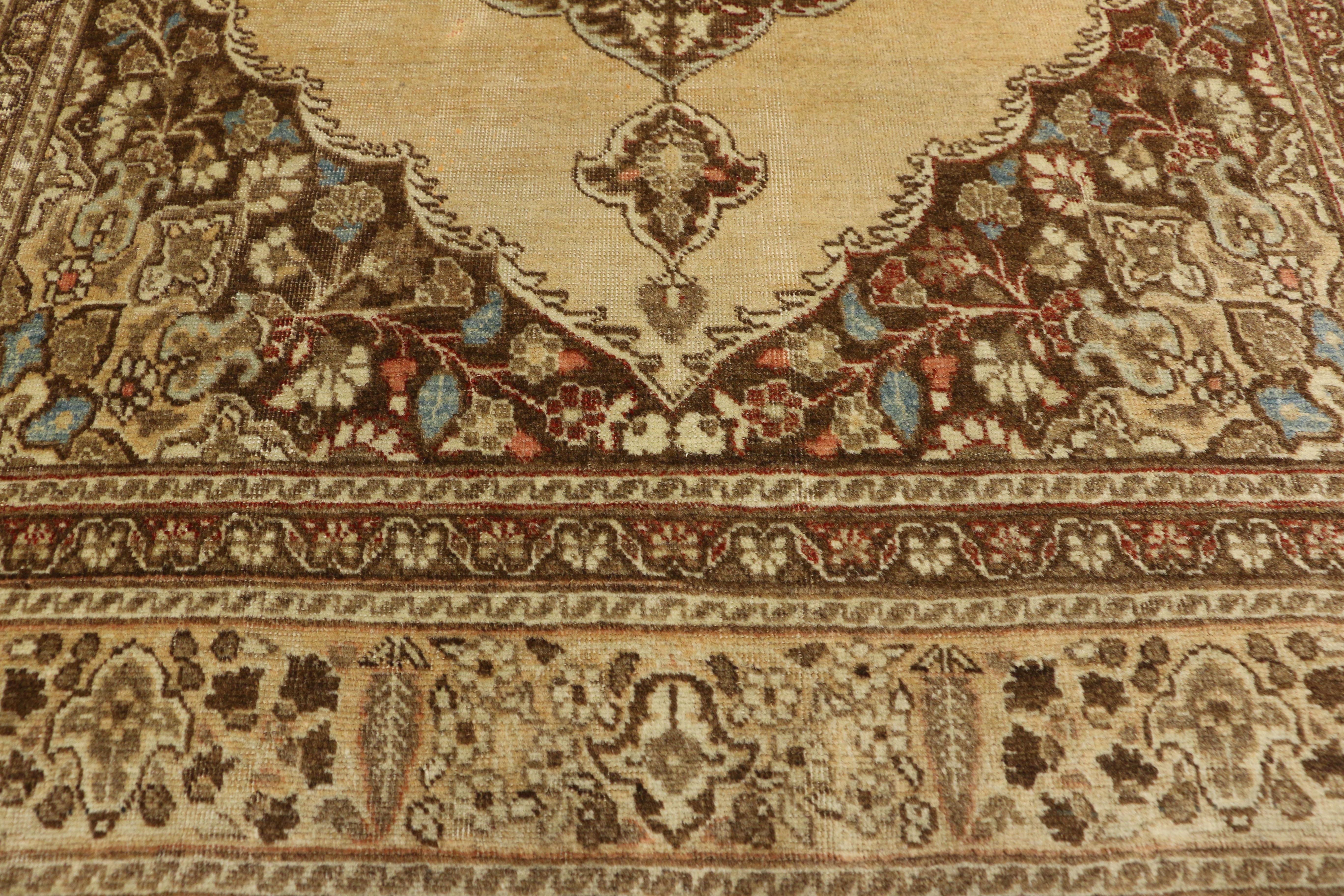20th Century Distressed Antique Persian Tabriz Accent Rug with Rustic Artisan Style For Sale