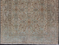 Antico tappeto persiano Tabriz in lana con disegno floreale all-over nei colori della terra