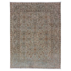 Antique Persian Tabriz Rug in Wool with All-Over Floral Design in Earth Colors