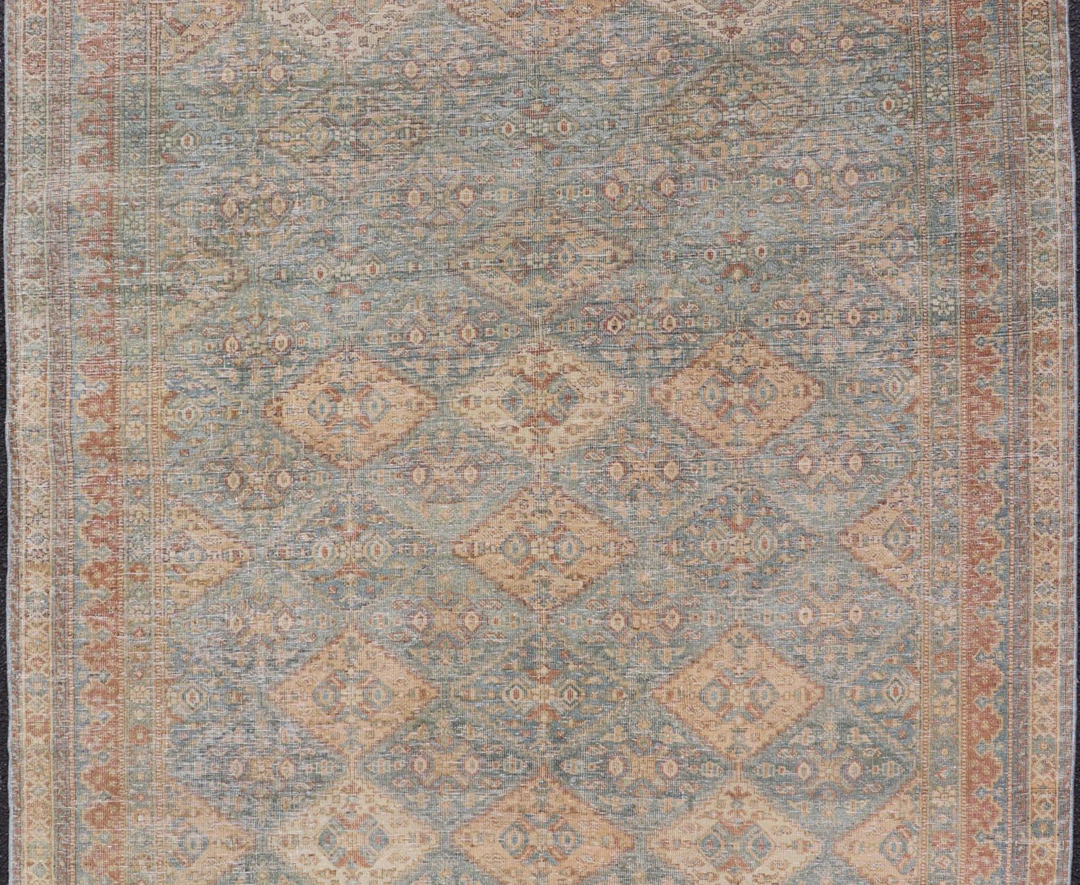 20th Century Antique Persian Tabriz Rug in Wool with Diamond Design in Blue, Apricot & Gray For Sale