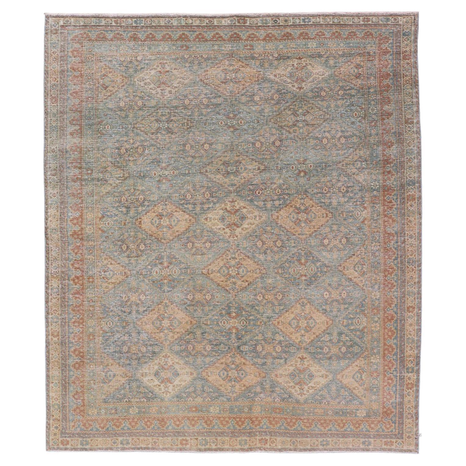 Antico tappeto persiano Tabriz in lana con disegno a diamante in blu, albicocca e grigio