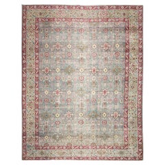 Tapis persan ancien de Tabriz à motif général bleu ciel et rouge