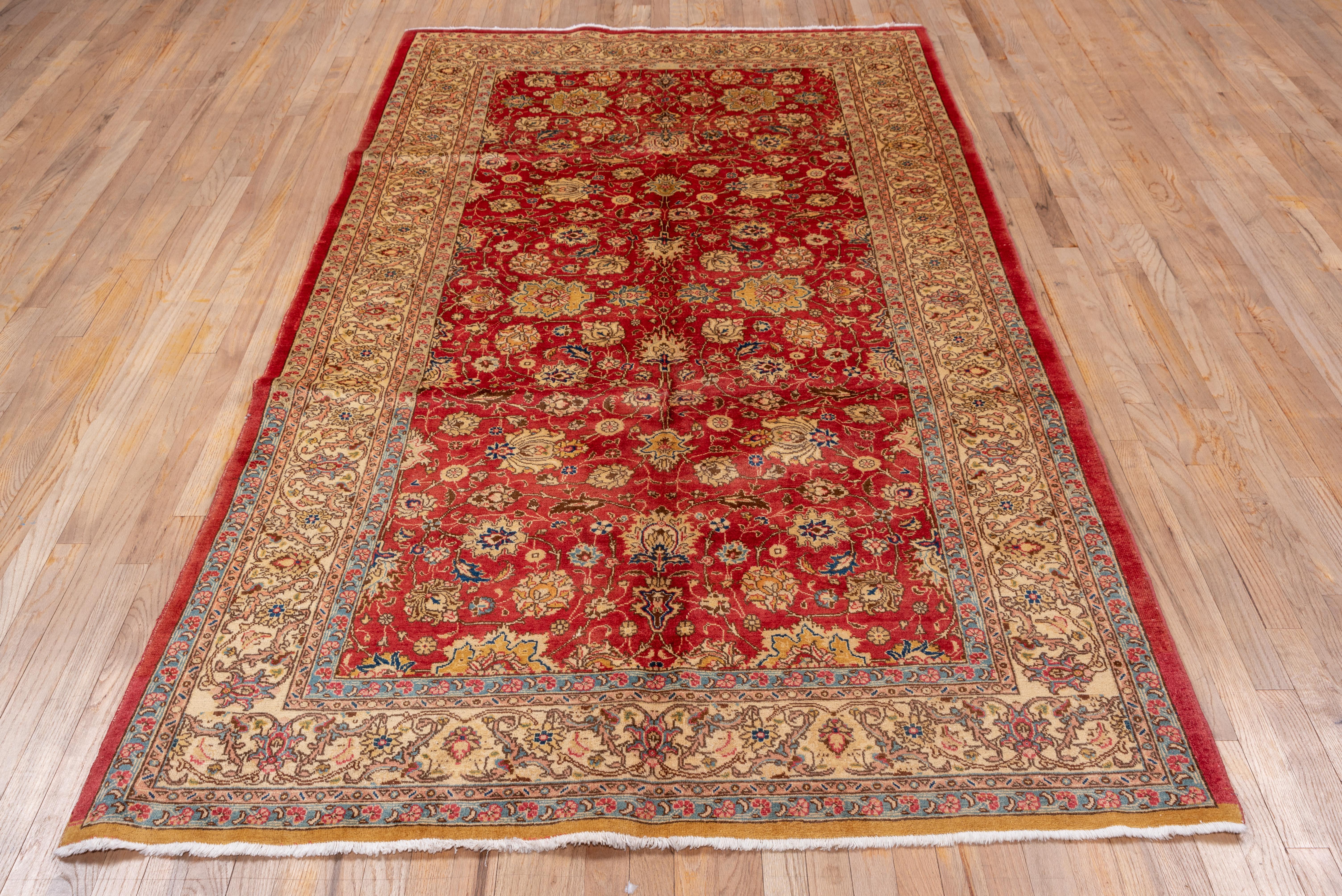 Mid-20th Century Antique Persian Tabriz Rug, Red Floral Field with Blue Accents, circa 1940s For Sale