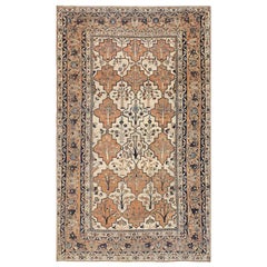 Antique Persian Tabriz Rug. Size: 5 ft 5 in x 9 ft 5 in (1.65 m x 2.87 m)