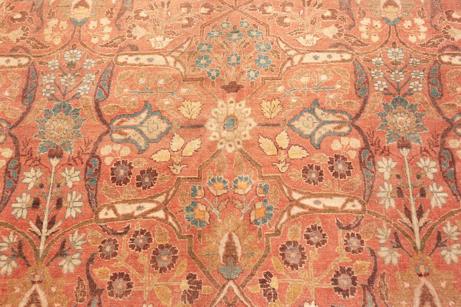 Antique Persian Tabriz rug, Country of Origin: Persia, Circa date: 1900. Size: 7 ft 6 in x 11 ft 3 in (2.29 m x 3.43 m)

