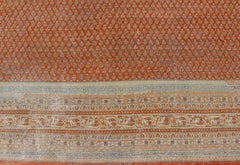 Antiker persischer Täbris-Teppich mit All-Over-Design auf kupferrotem Hintergrund