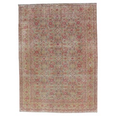 Antique Persian Tabriz Rug With All-Over Design in Light Green, Pink, and Red