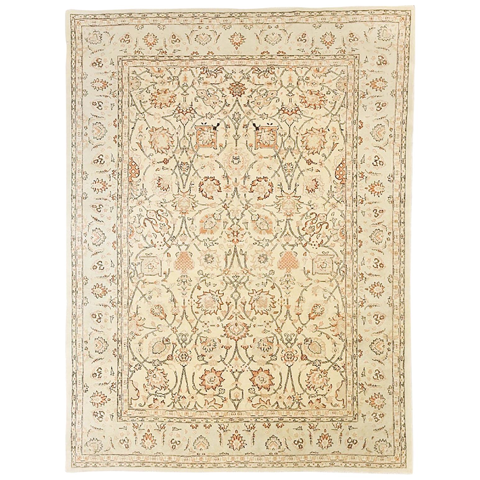 Antique Persian Tabriz Rug with Black and Beige Floral Details Over Ivory Field For Sale