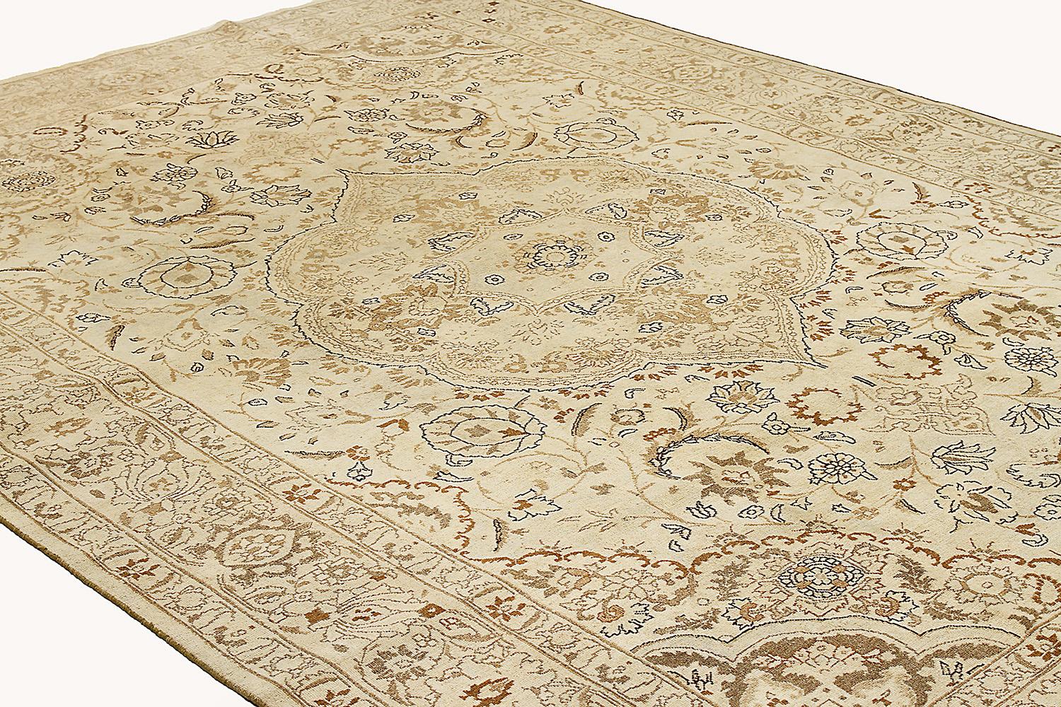 Hand-Woven Antique Persian Tabriz Rug with Black and Brown Floral Motifs on Ivory Field For Sale