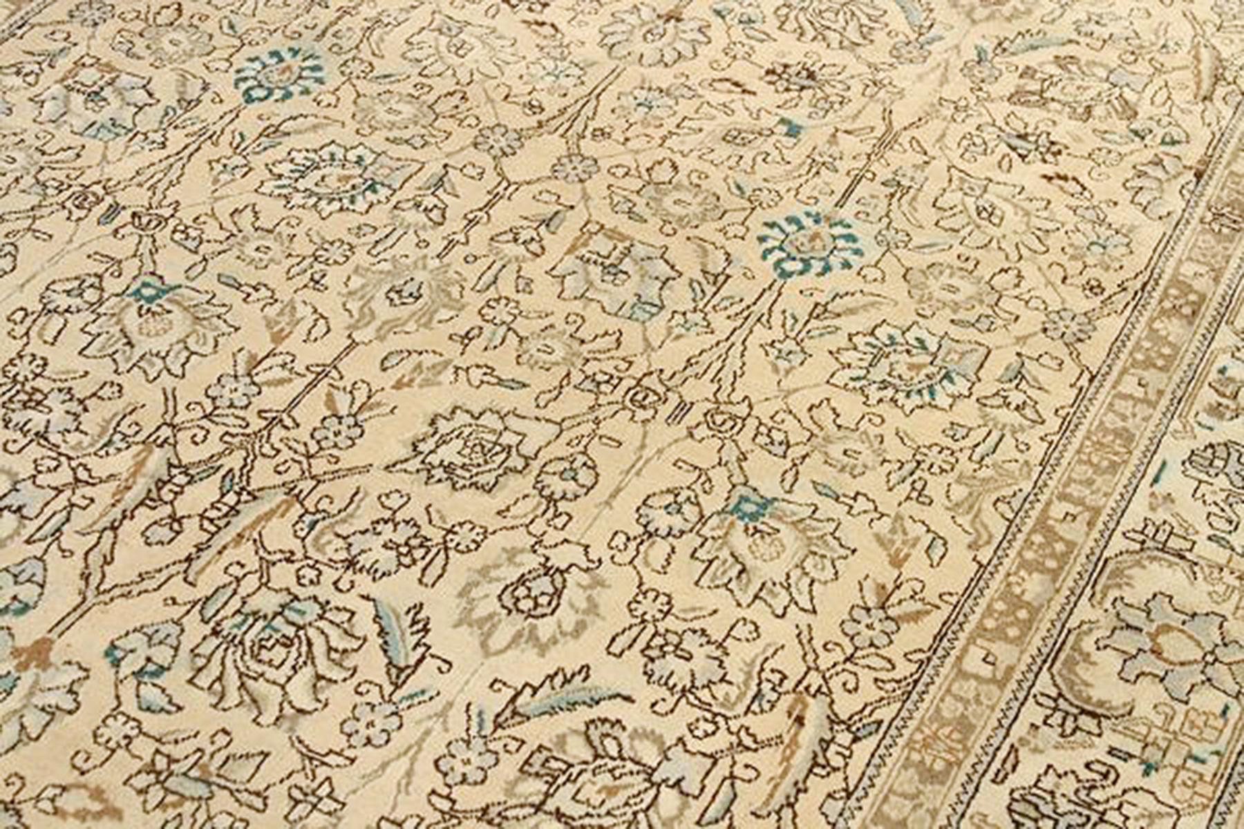 Hand-Woven Antique Persian Tabriz Rug with Black and Green Floral Details on Beige Field For Sale