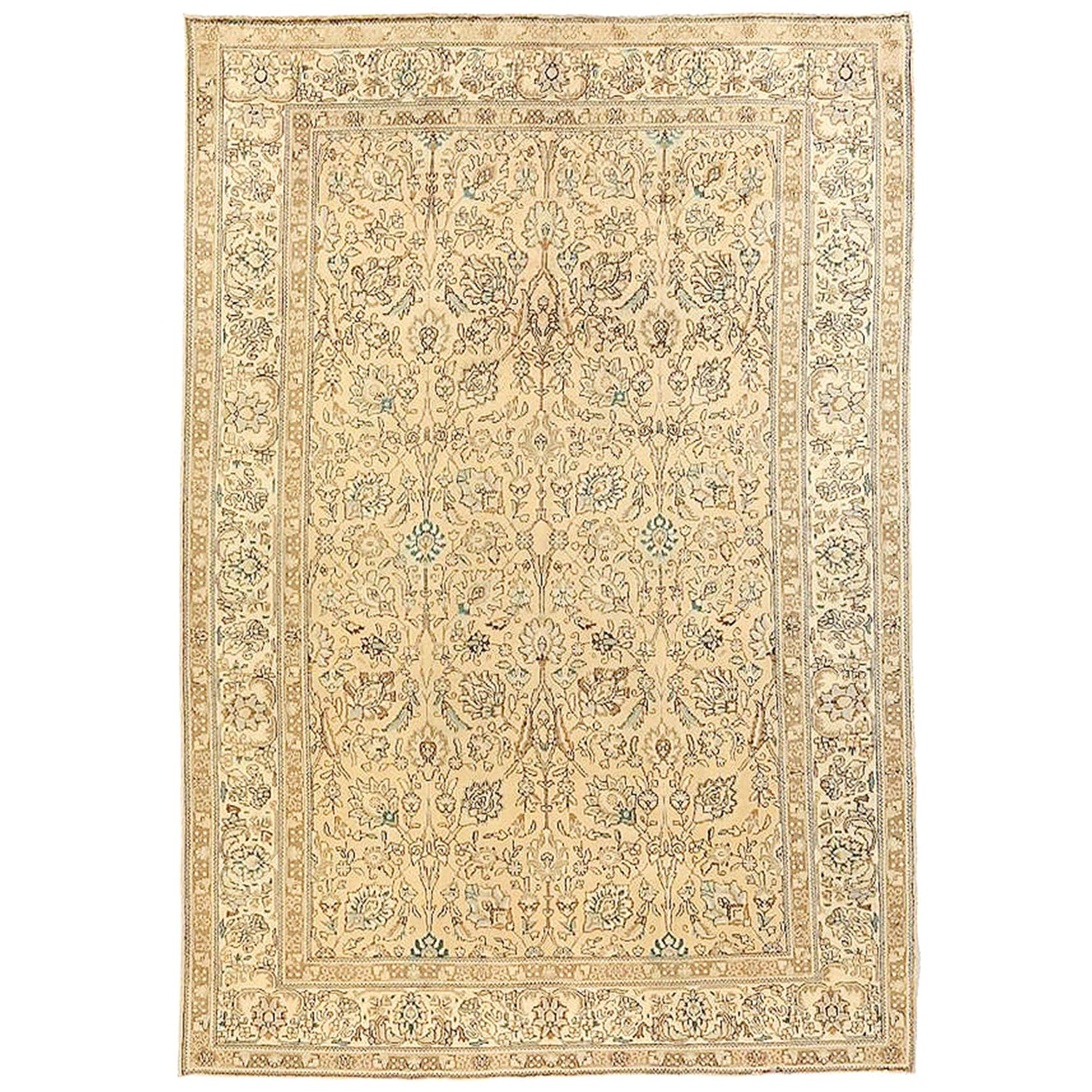 Antique Persian Tabriz Rug with Black and Green Floral Details on Beige Field