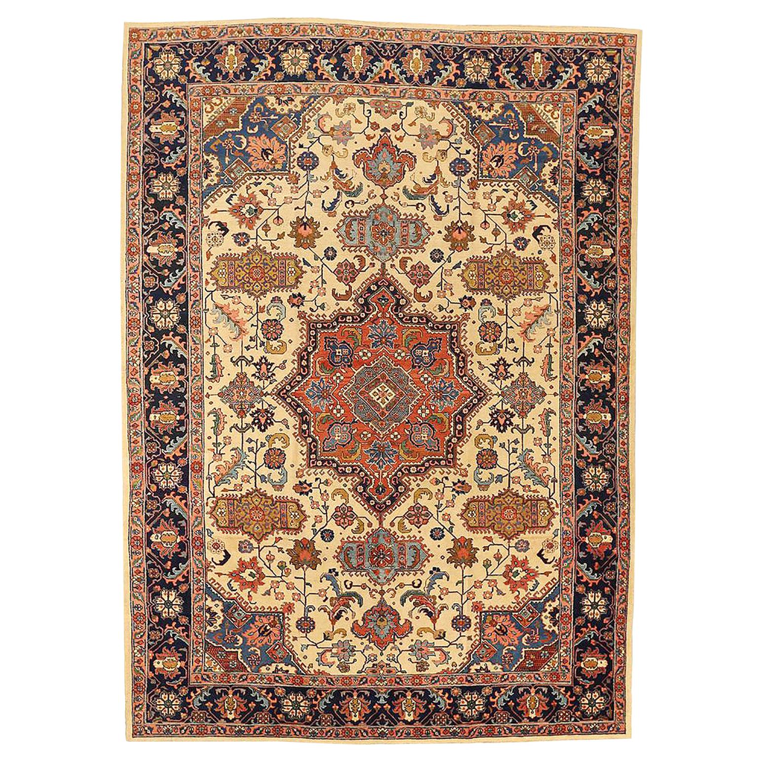 Antique Persian Tabriz Rug with Central Medallion Surrounded by Floral Motifs For Sale